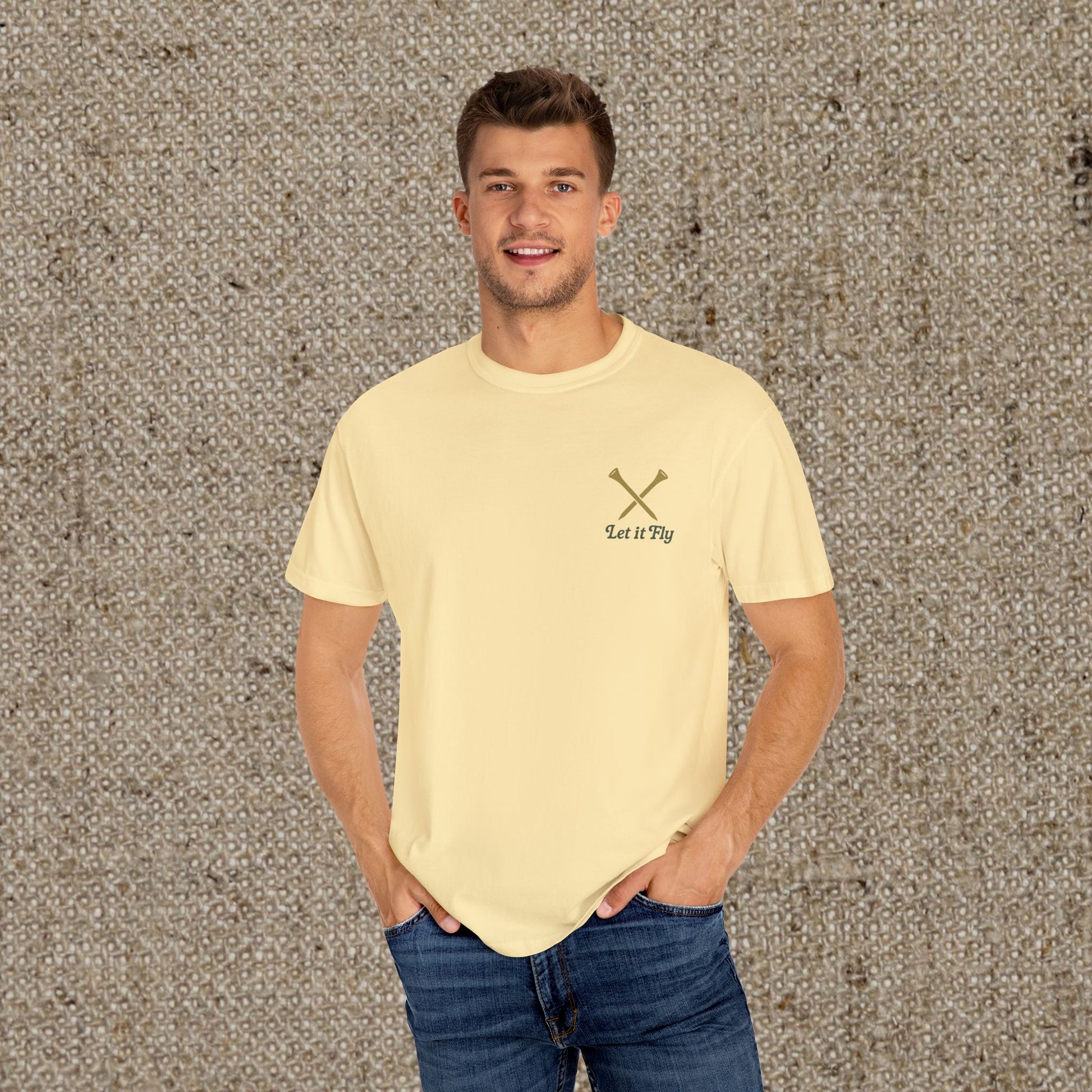 Model wearing the Tee It High Let It Fly Graphic Tee in yellow, highlighting the stylish design and comfortable fit ideal for all occasions.