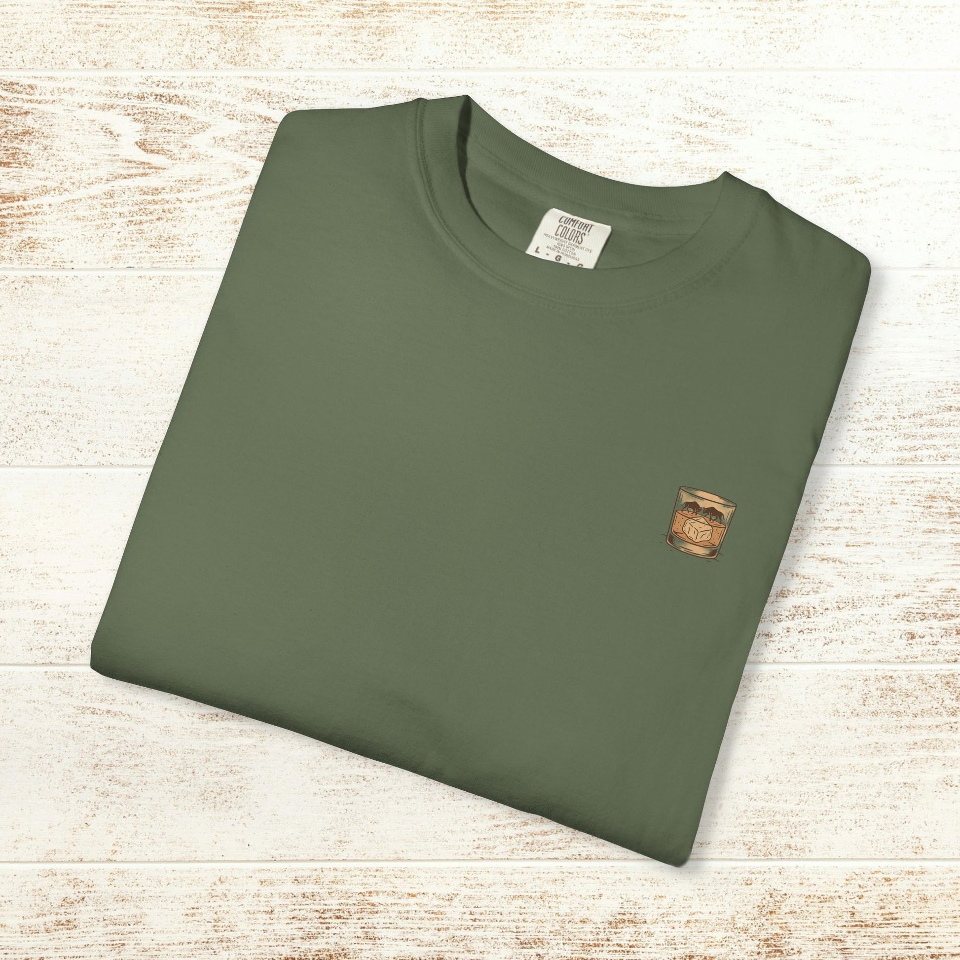 Rodeo On The Rocks Tee displayed flat in a stylish green color, made from soft garment-dyed 100% US cotton, perfect for everyday style.