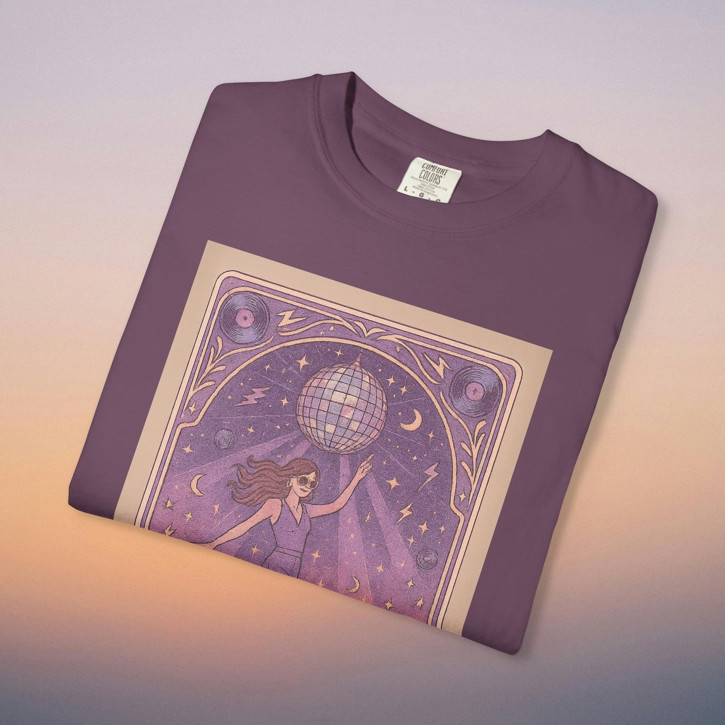 Groove Tarot Graphic Tee in rich purple color, showcasing a mystical design featuring a woman with a disco ball, perfect for stylish and artistic fashion.