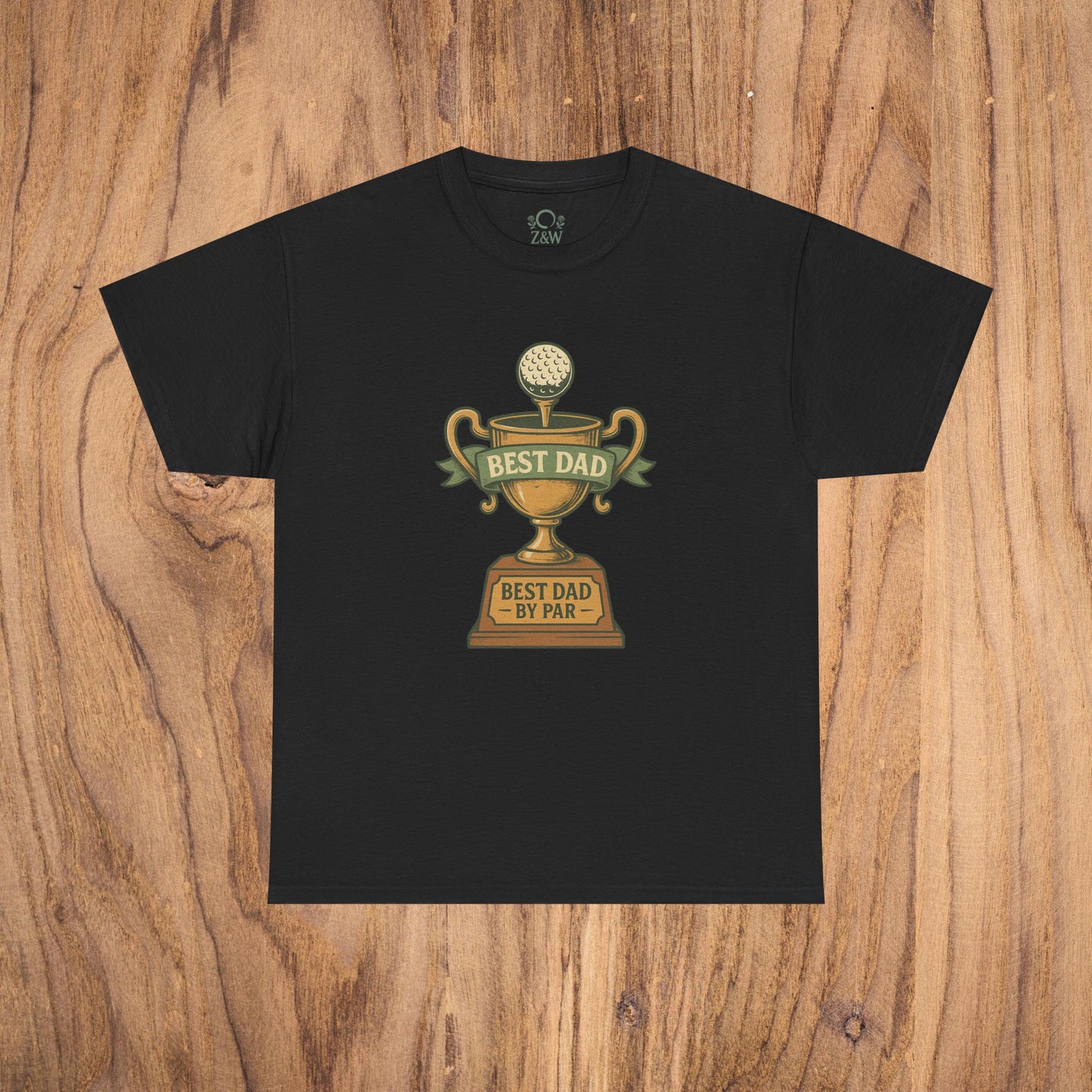 Best Dad Trophy T-Shirt presented on a wooden surface, with a striking design of a trophy and the words 'BEST DAD BY PAR', combining durability and style in a classic black color.