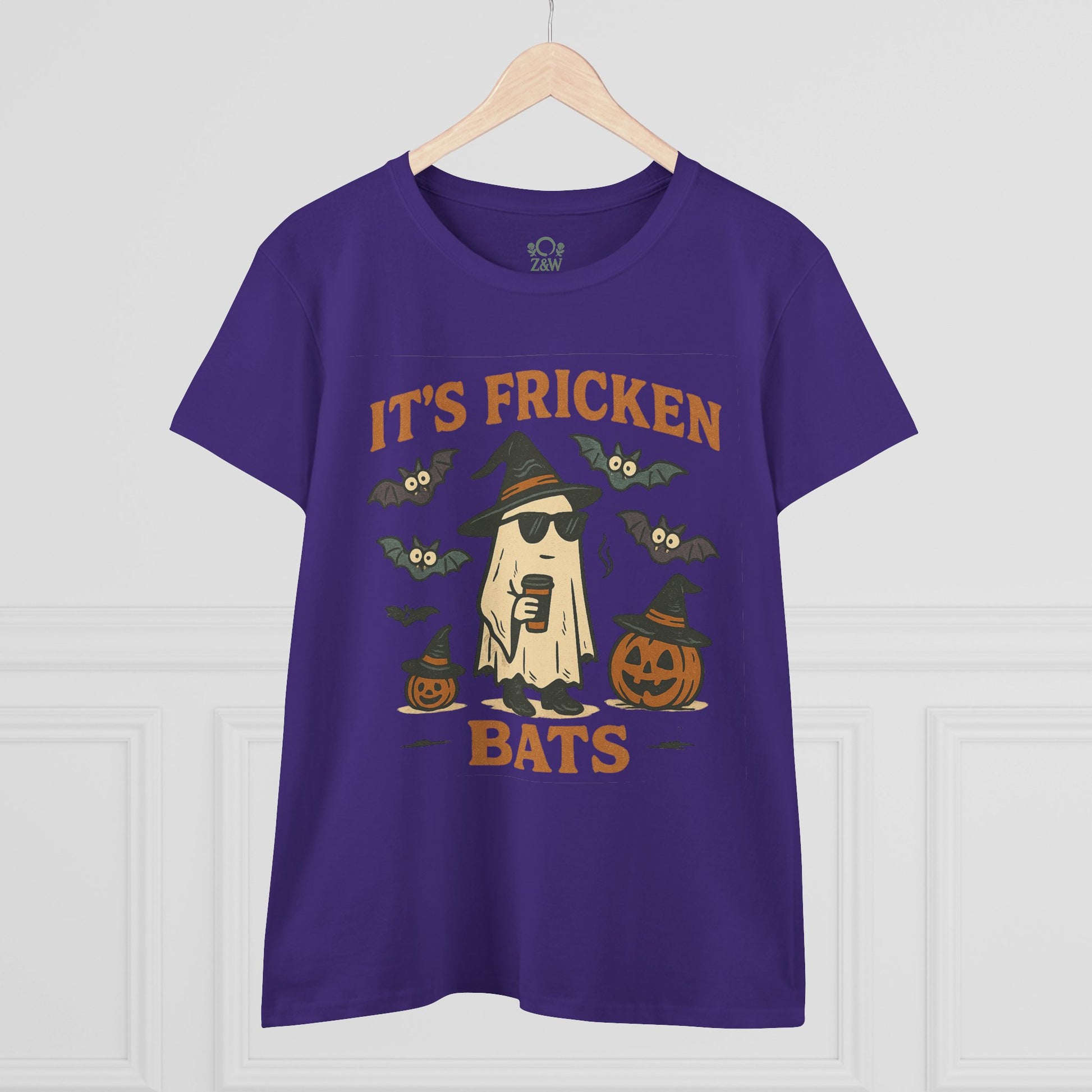 Halloween Unisex T-Shirt in purple displaying a graphic of a ghost with sunglasses, bats, and pumpkins. Made from 100% cotton, perfect for trick-or-treating.