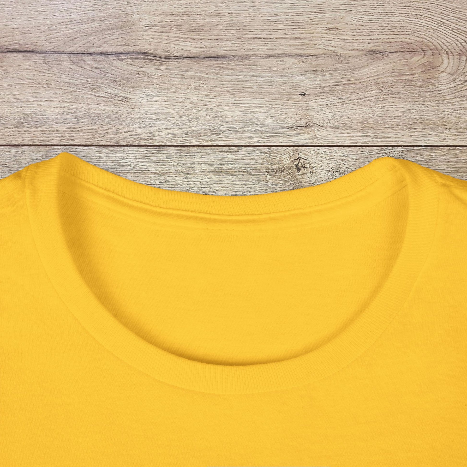 Close-up of the collar of the Golf Wives Social Club Tee in yellow, highlighting the quality of the fabric and design.