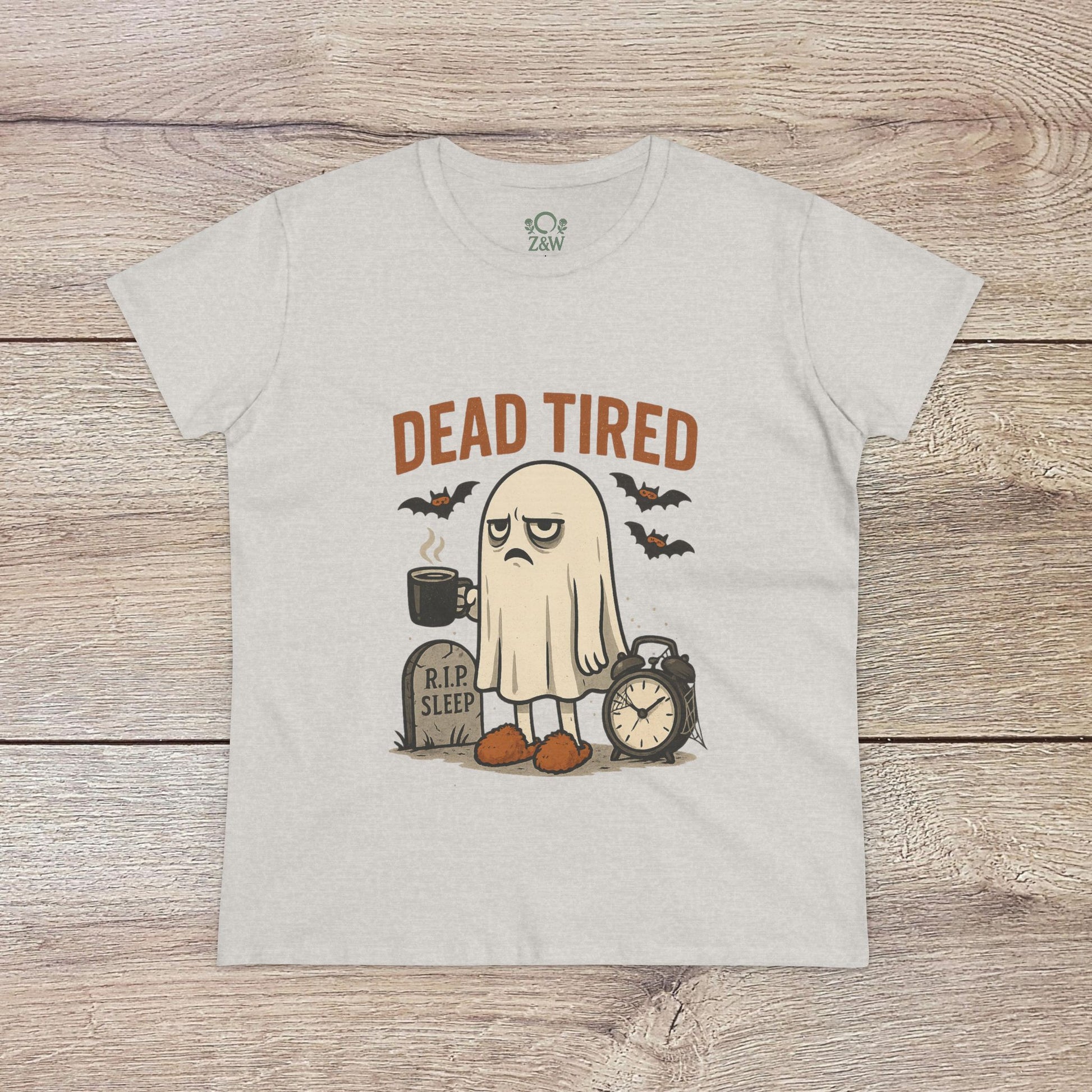 Cute Whimsical Ghost T-Shirt for Halloween featuring a 'Dead Tired' ghost illustration on a light gray tee, made from cozy 100% cotton, perfect for gifting.