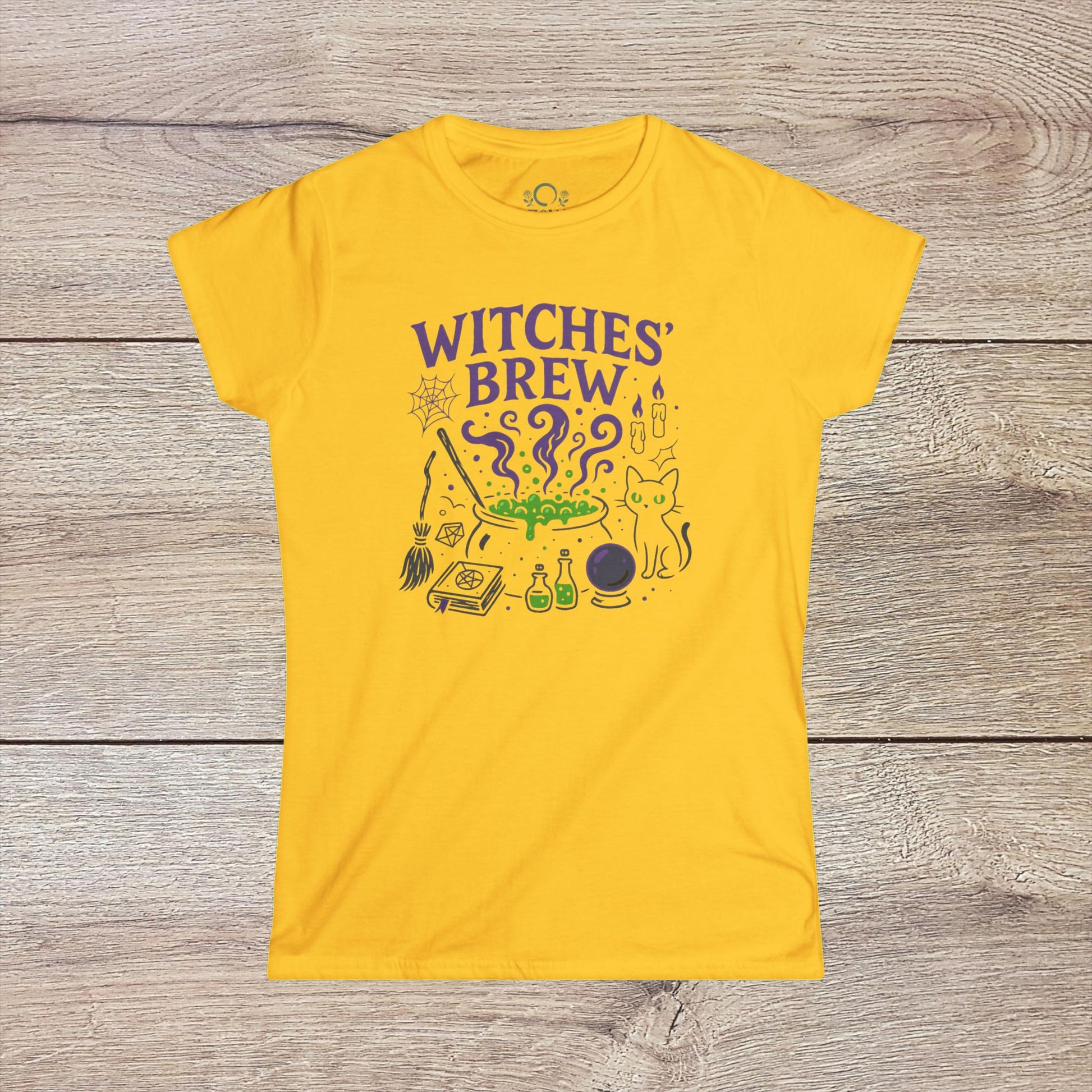 Witches' Brew Halloween T-Shirt in yellow color showcasing a lively print with spooky motifs and a playful cat, ideal for festive autumn wear.
