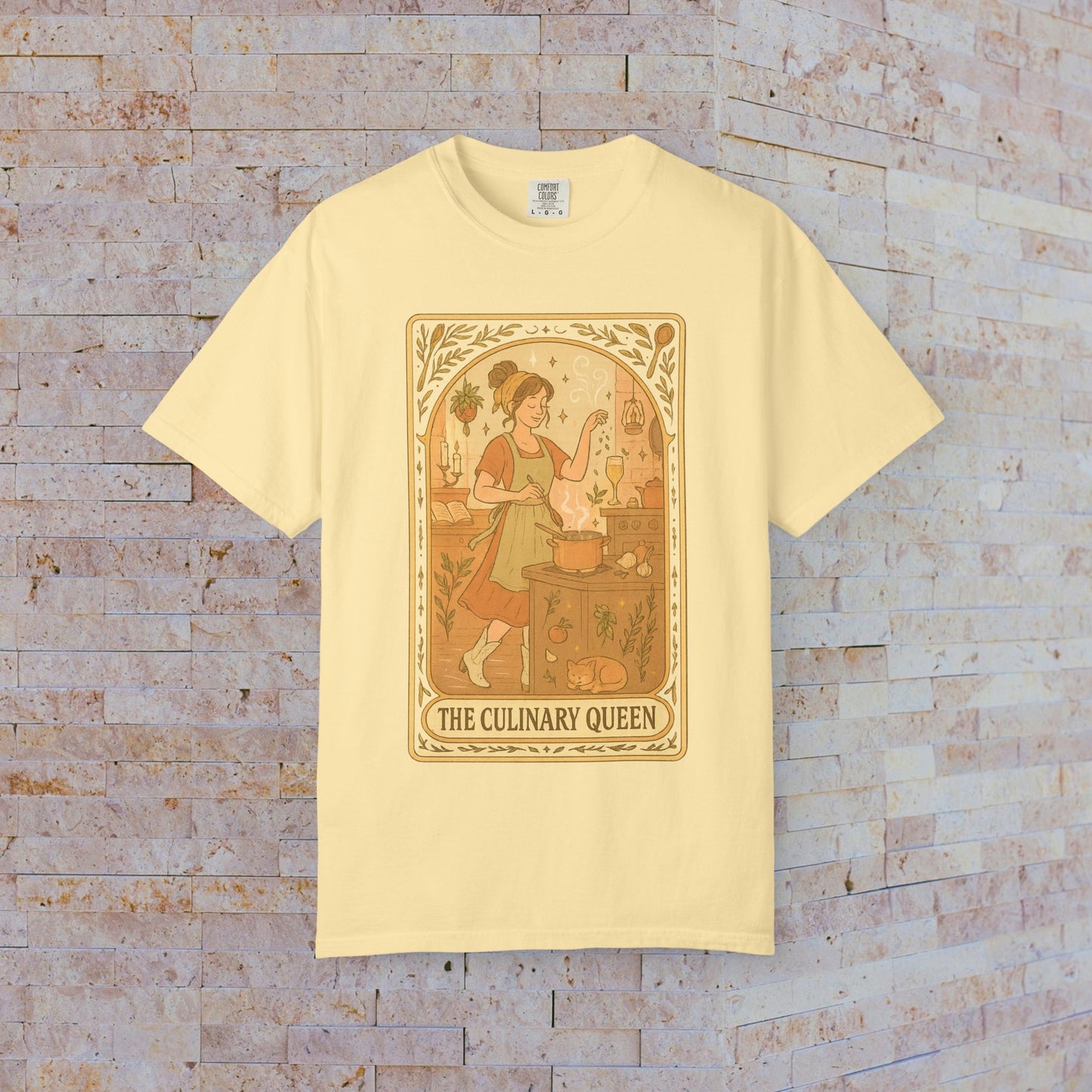 Culinary Queen Tarot Tee in yellow, showcasing a charming illustration of a girl in a culinary scene. Soft cotton tee offered in sizes S to 4XL, pre-shrunk for durability.