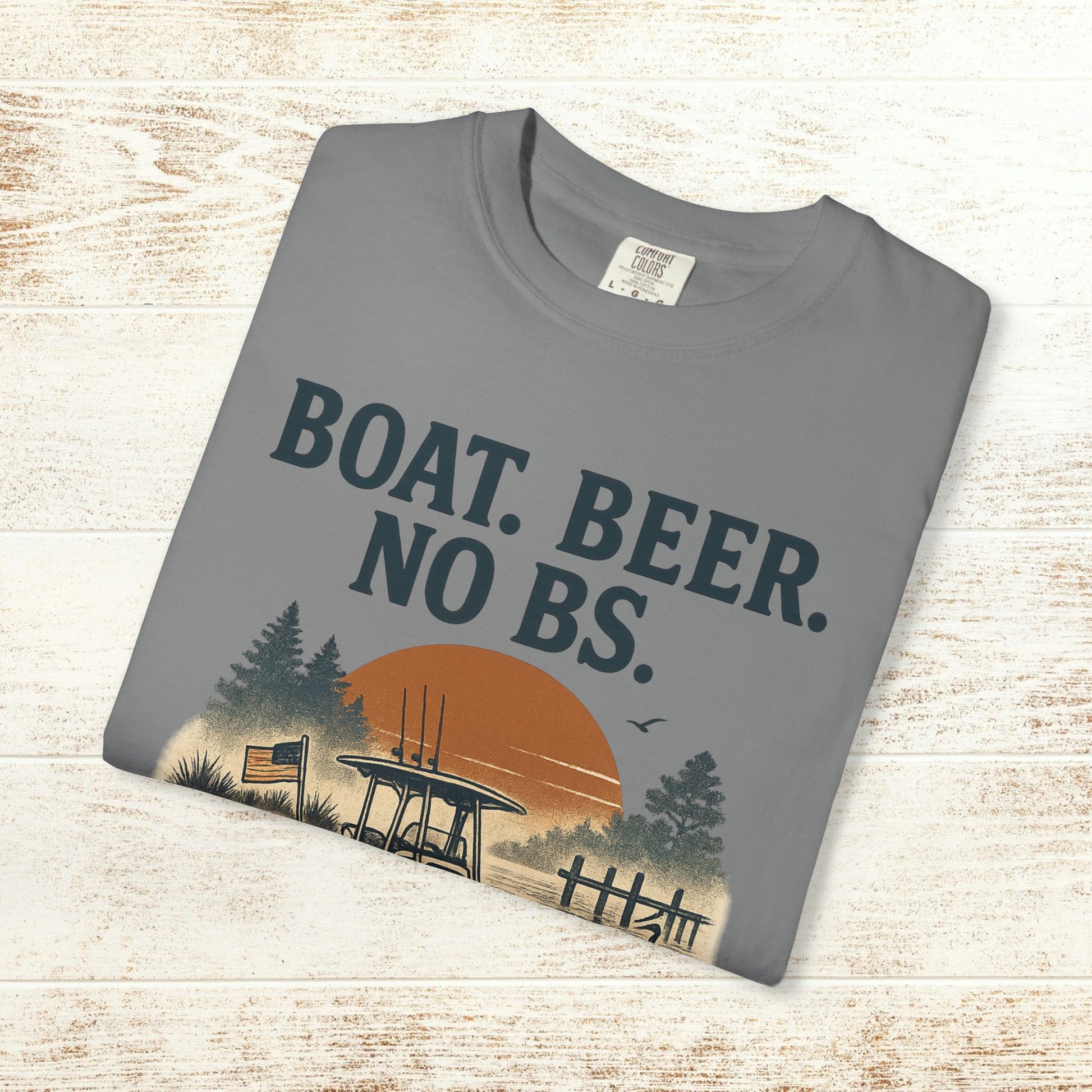 Boat Beer No BS Tee displayed flat, showcasing the humorous slogan and scenic design with a fishing theme.