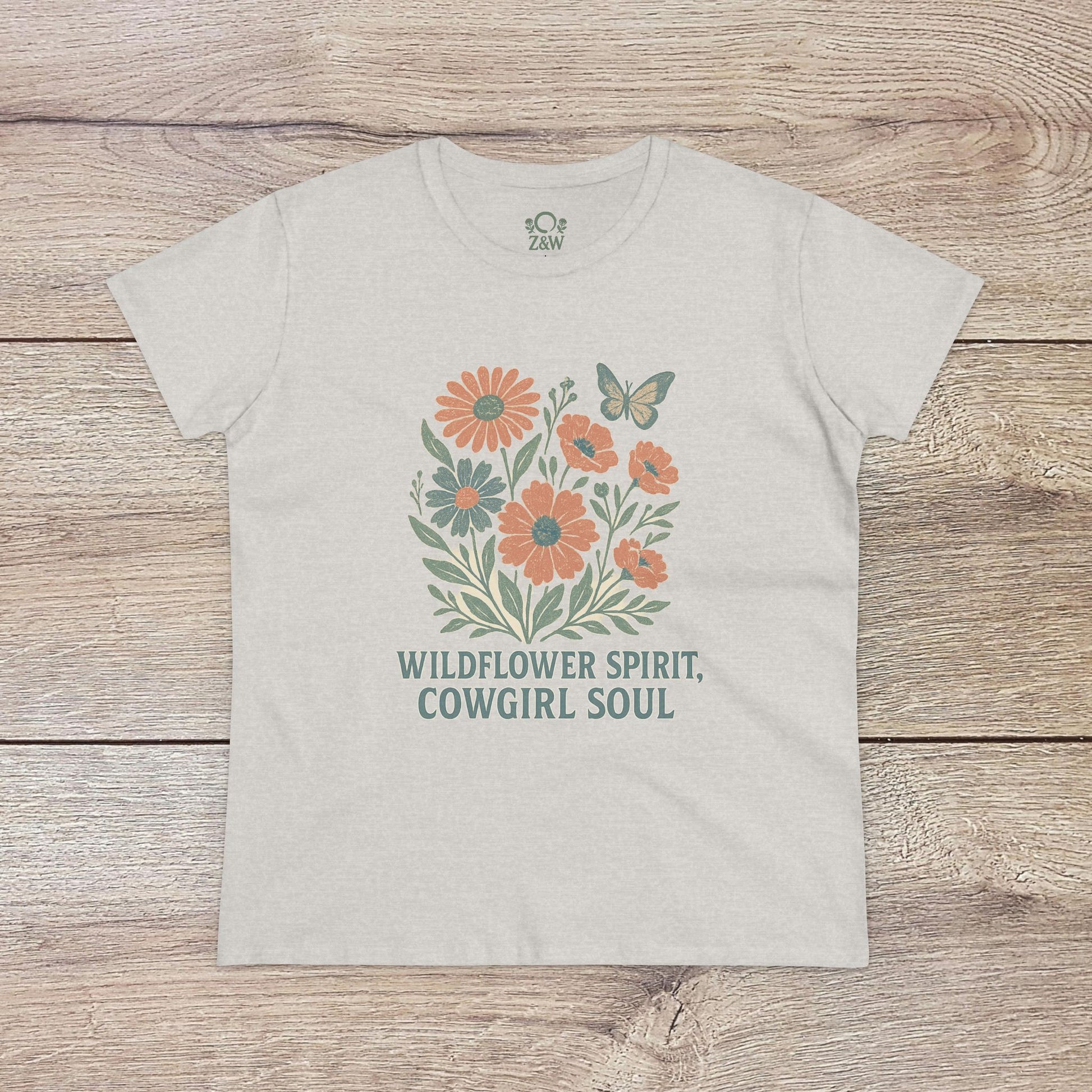 Wildflower Spirit Cotton Tee in light gray, showcasing a beautiful flower arrangement with the text 'WILDFLOWER SPIRIT, COWGIRL SOUL' - perfect for a relaxed look.