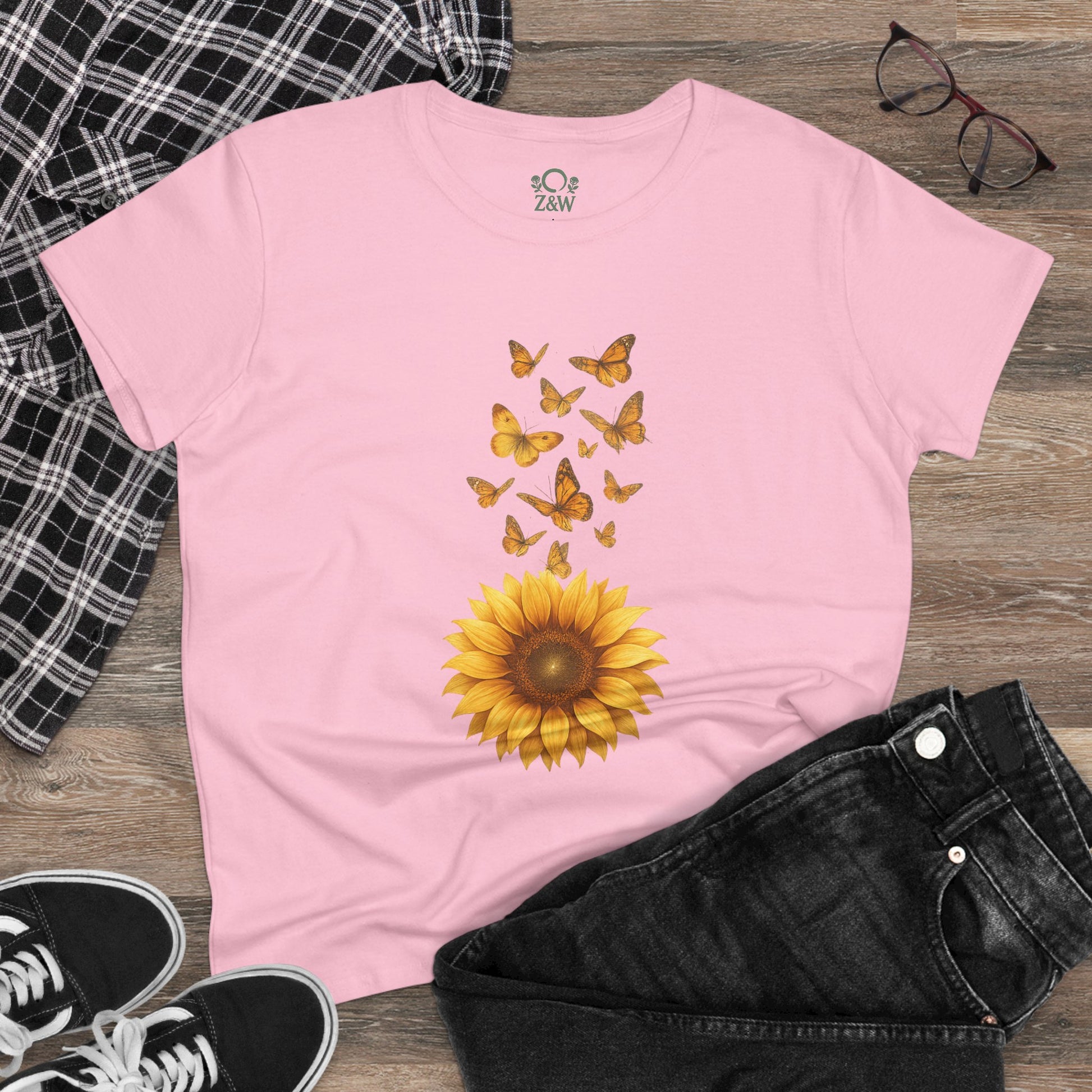 Sunflower & Butterflies Cotton Tee for Women in soft pink, elegantly displaying a sunflower and butterfly motif, made from 100% breathable cotton for everyday comfort.