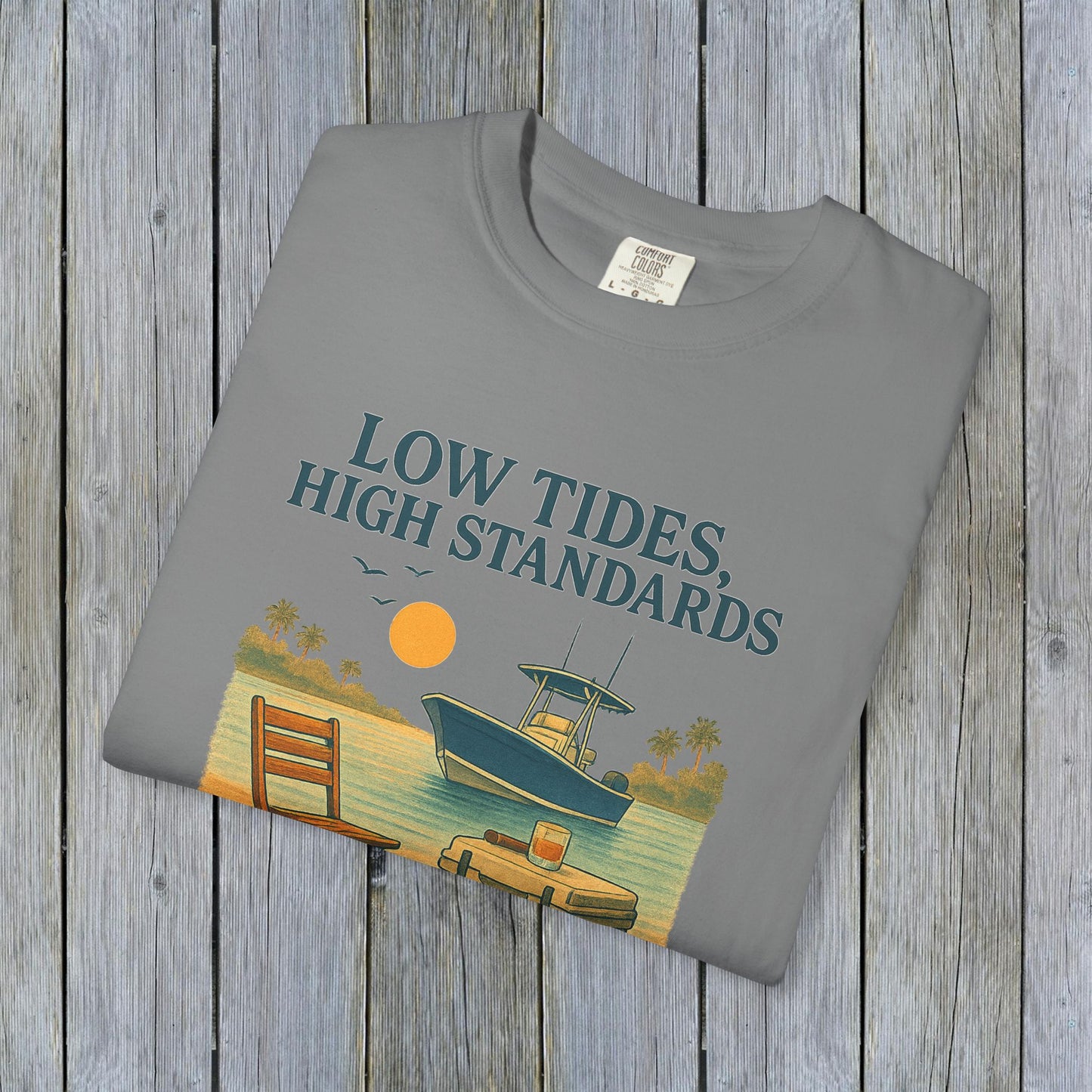 Garment-Dyed Low Tides High Standards T-Shirt in gray featuring a serene boat scene and sunset, designed for comfort and casual elegance.