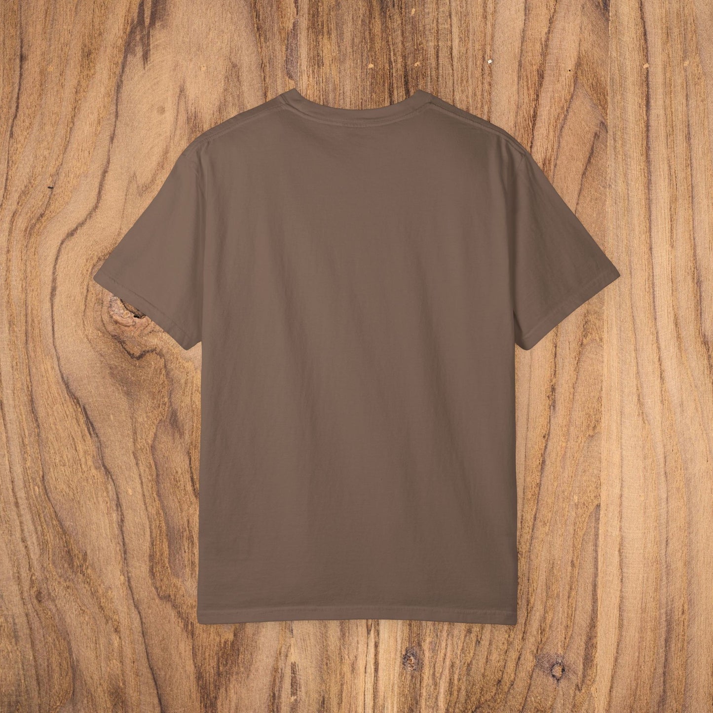 Back view of the Sunset Trees Unisex T-Shirt in brown, highlighting the soft 100% cotton fabric and garment-dyed quality.