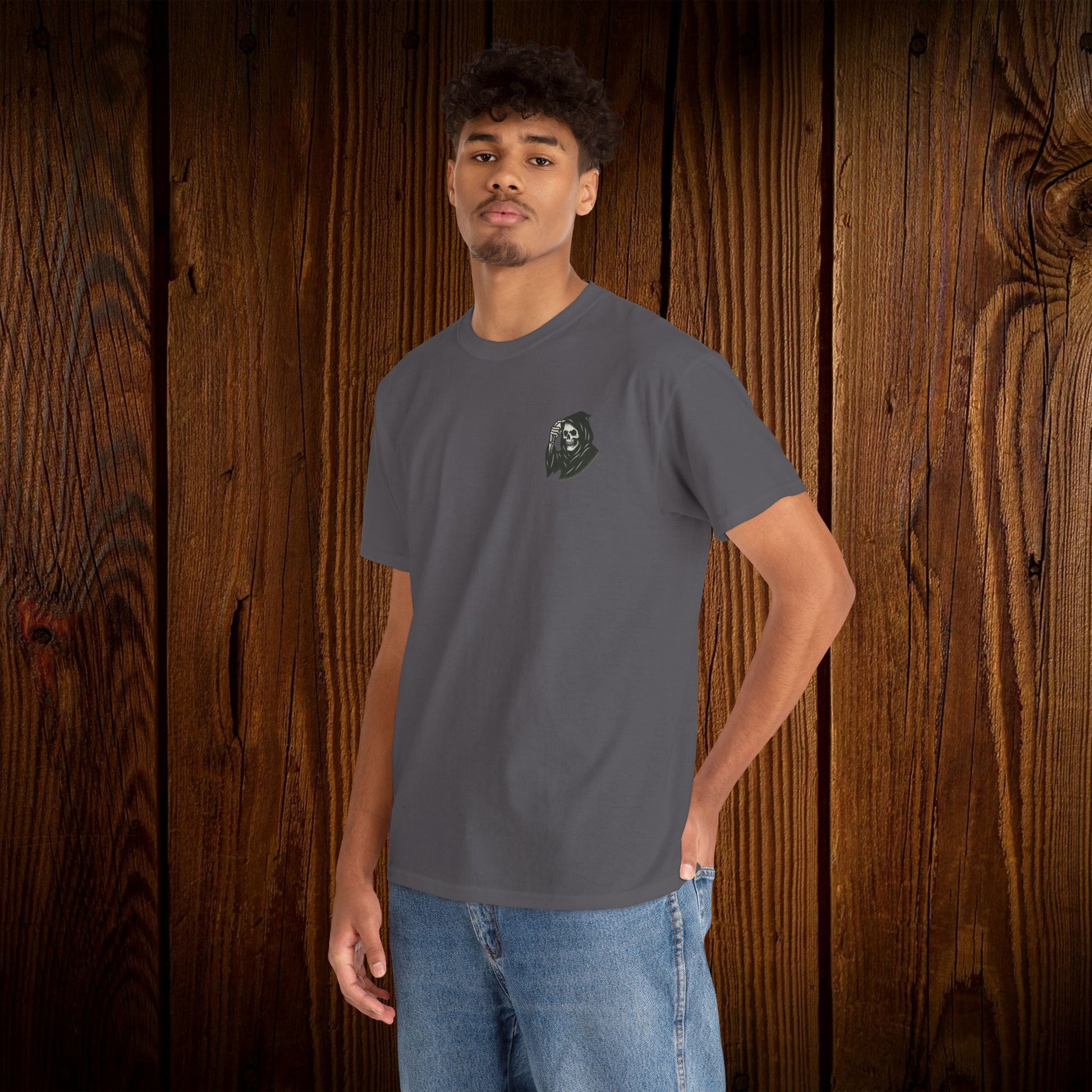 Model wearing the Spooky Halloween Graphic Tee in gray, featuring a small ghost design, perfect for casual use during Halloween.