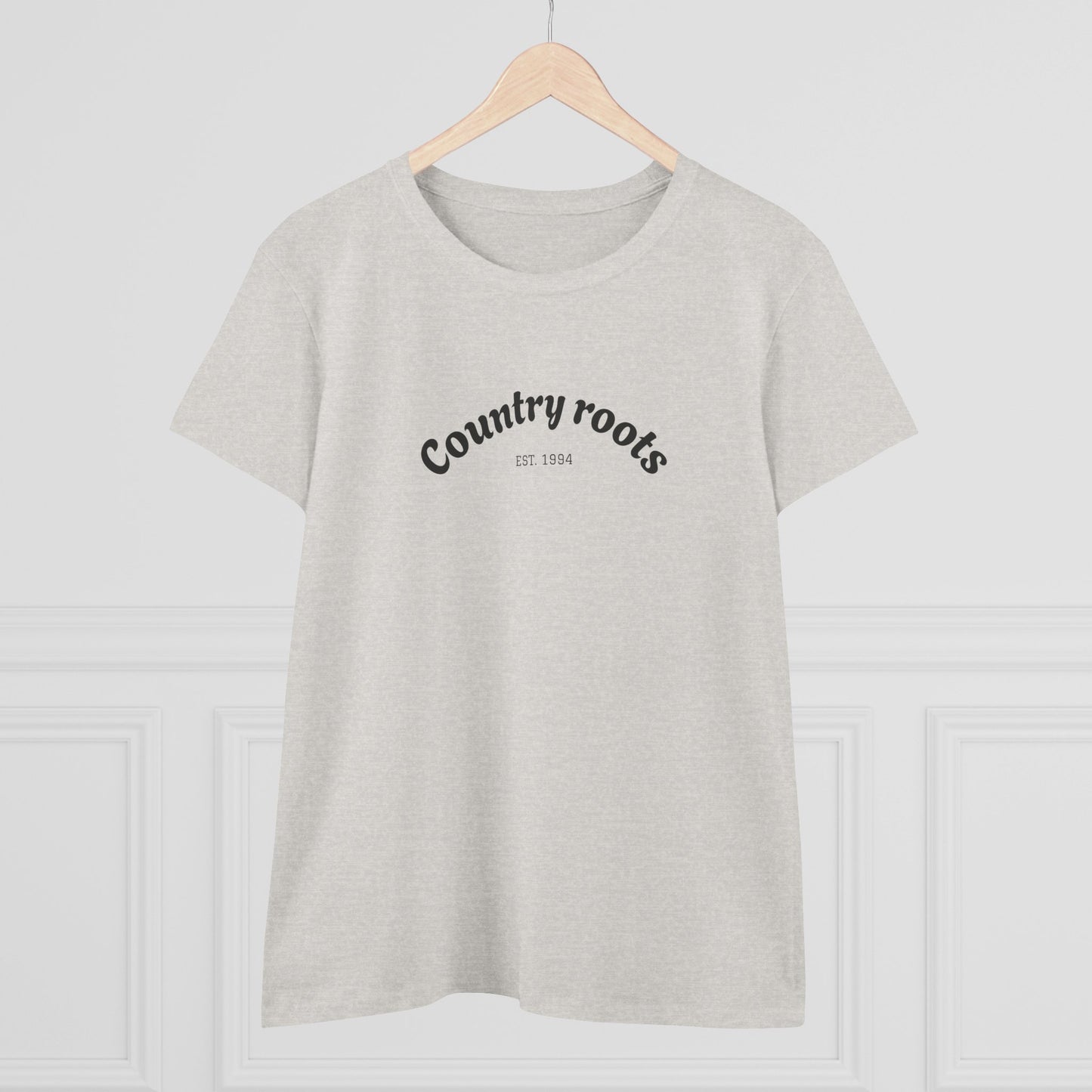 Casual light grey Country Roots Cowgirl Tee presented on a clean, bright background, featuring 'Country roots EST 1984'. An essential for stylish everyday wear.