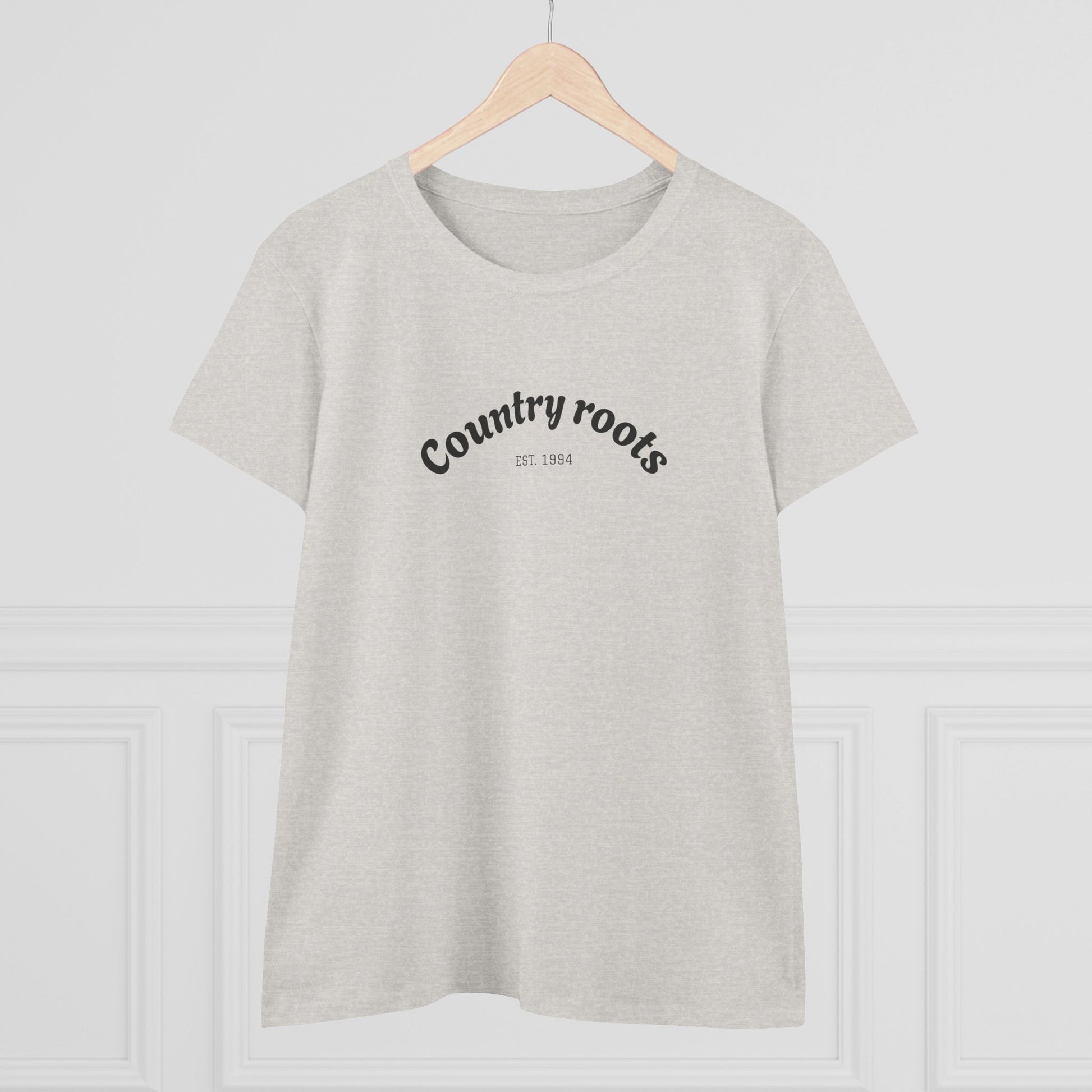 Casual light grey Country Roots Cowgirl Tee presented on a clean, bright background, featuring 'Country roots EST 1984'. An essential for stylish everyday wear.