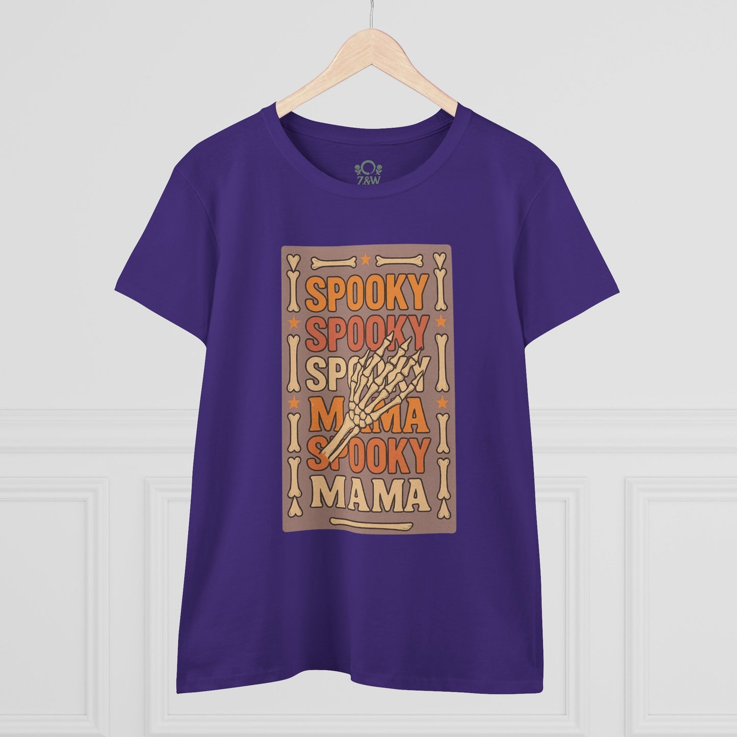 Spooky Mama Tee featuring a playful skeleton hand graphic on a purple background; made from soft cotton for a classic fit and durable design, ideal for all occasions.