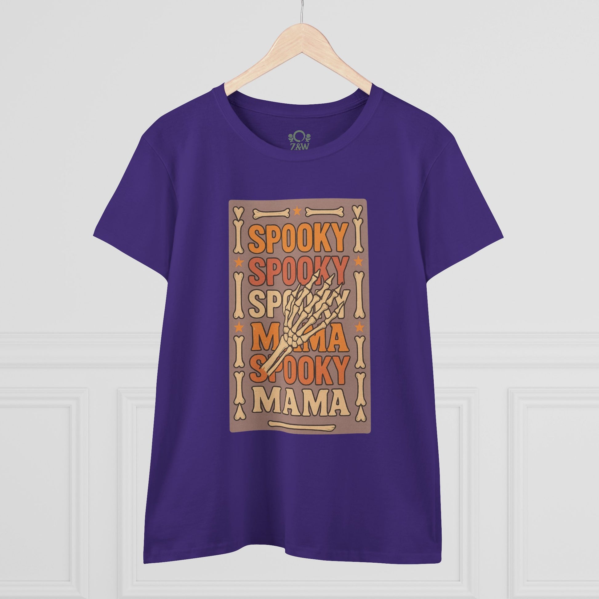 Spooky Mama Tee featuring a playful skeleton hand graphic on a purple background; made from soft cotton for a classic fit and durable design, ideal for all occasions.