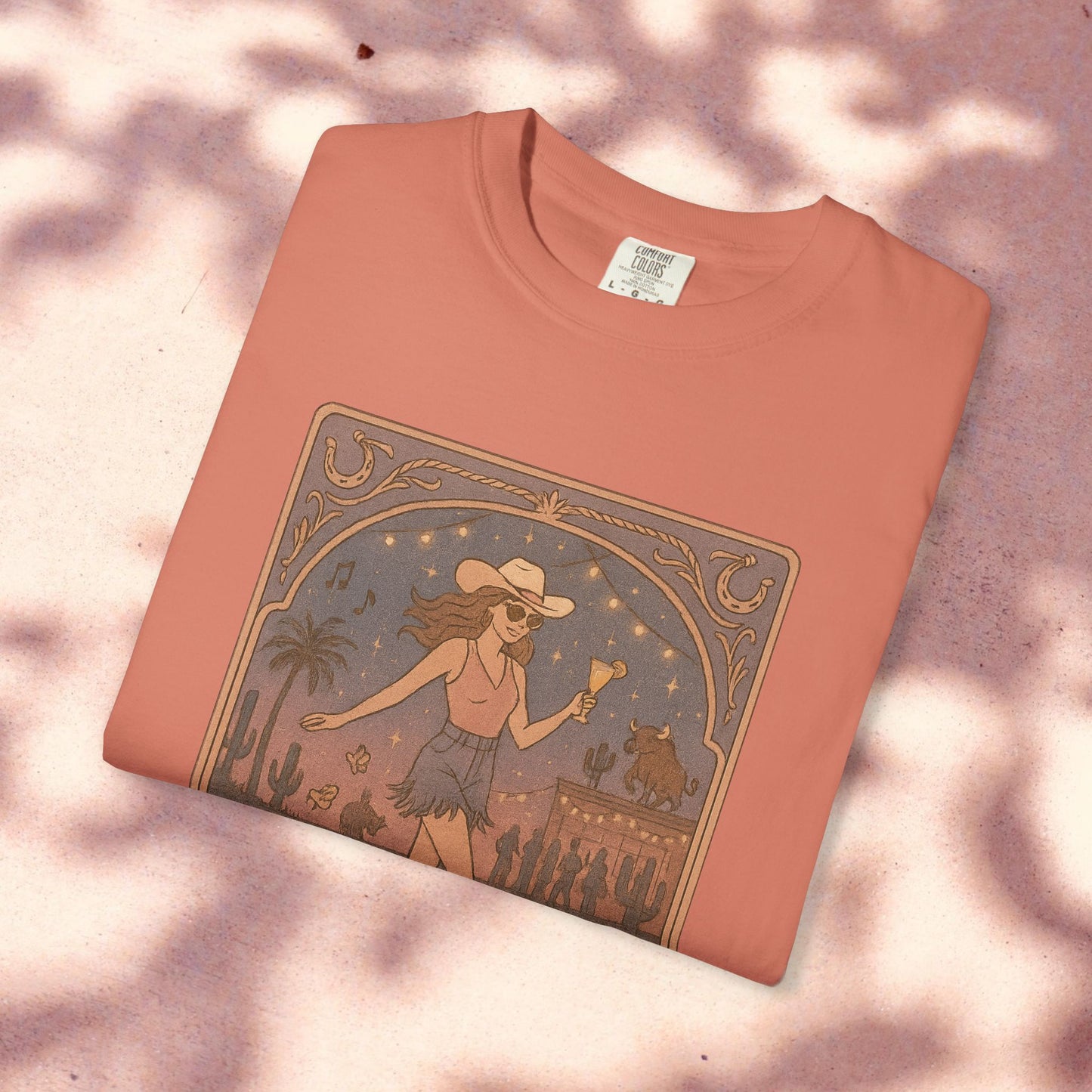 Line Dancer Tarot Tee in coral color, featuring a unique design of a dancing girl among desert scenery, made from soft cotton and ethically produced.