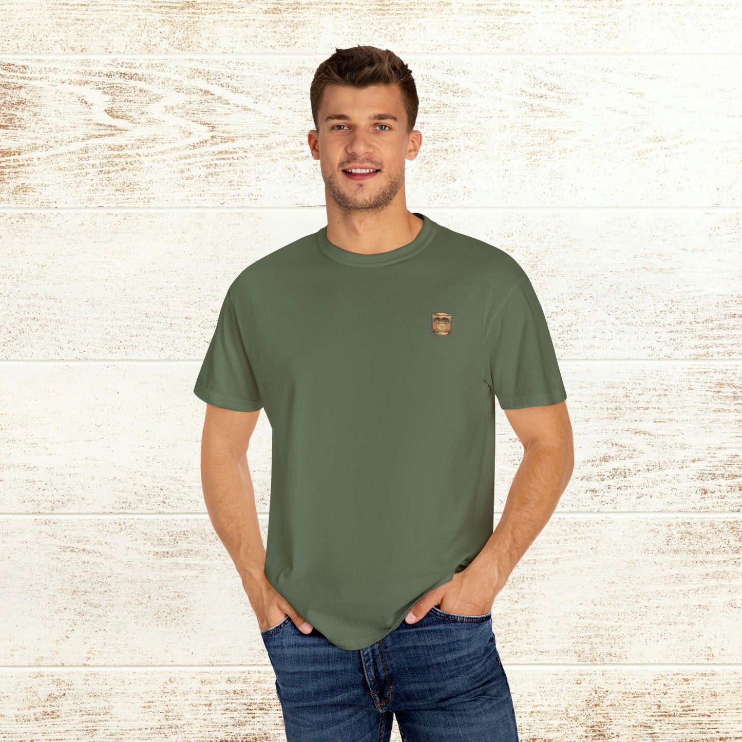 Model showcasing the green Rodeo On The Rocks Tee, emphasizing its comfortable fit and unique cotton material.