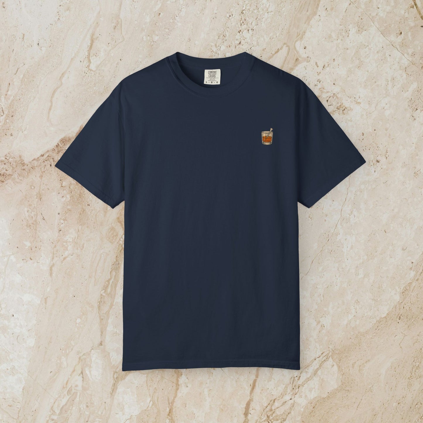 Golden Whiskey Dog Tee in navy blue color, emphasizing a unique vintage style, made from 100% cotton, featuring a relaxed fit with a left chest pocket.