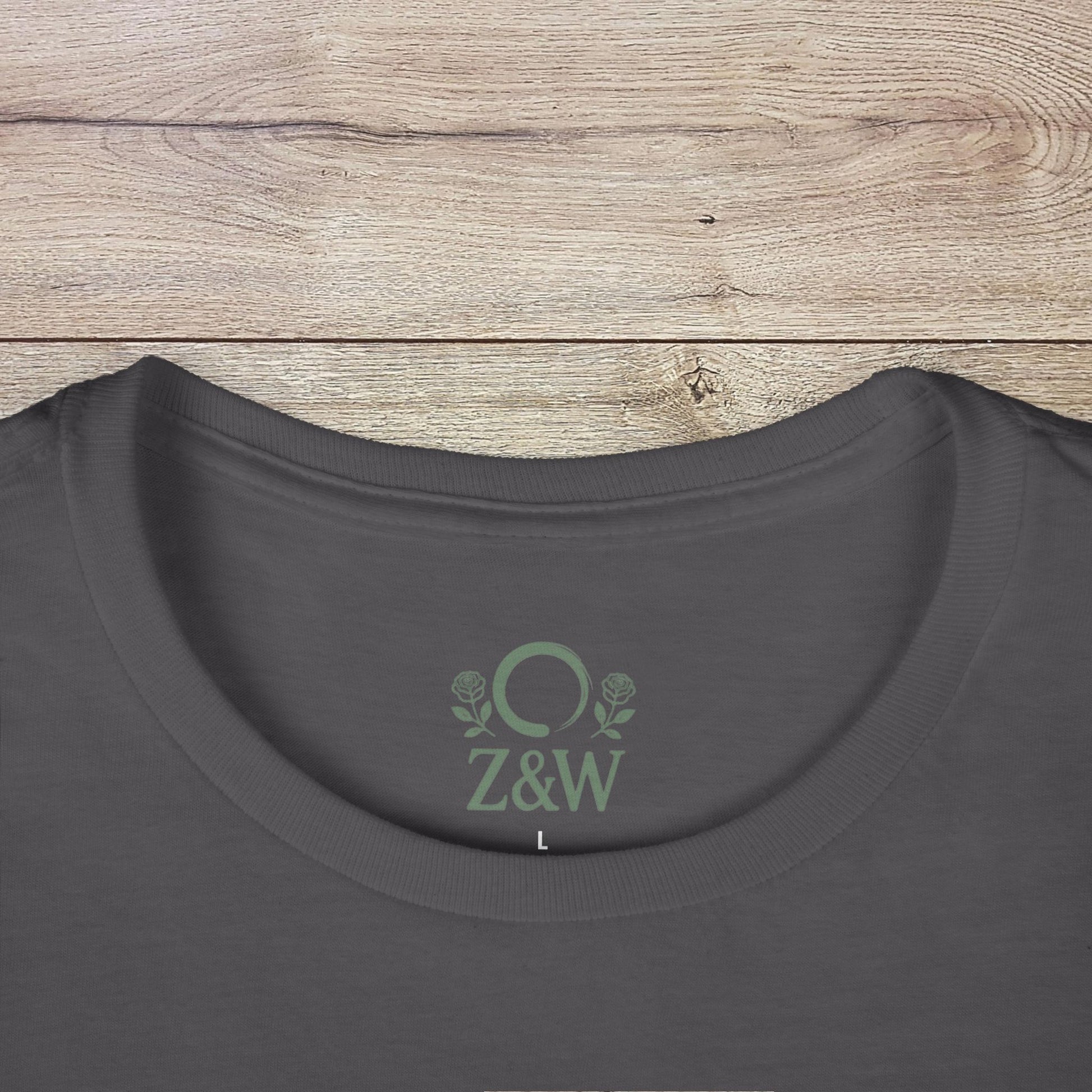 Close-up of the neckline on a dark grey Funny Pilates T-Shirt with durable shoulder tape and Z&W logo, ideal for everyday wear.