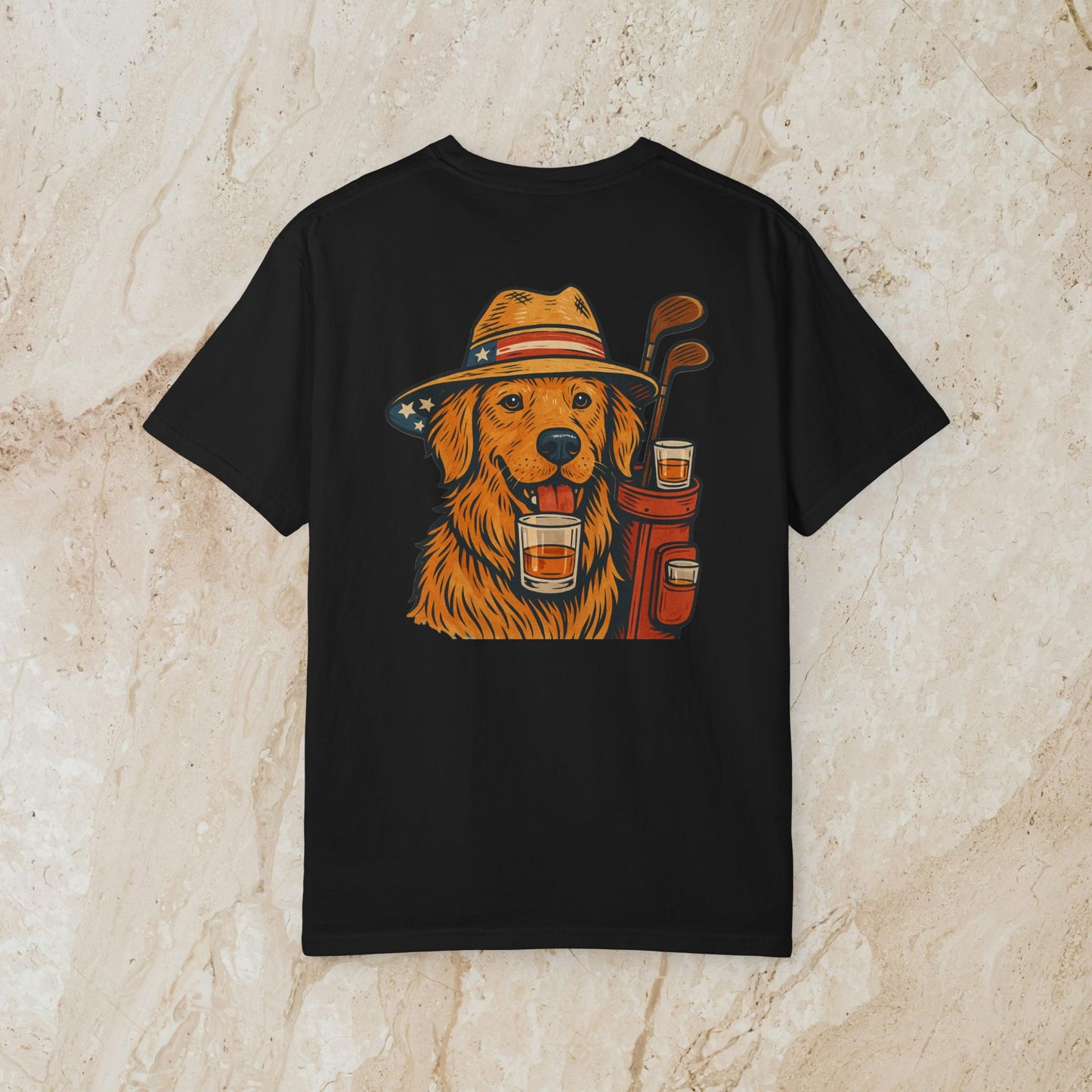 Golden Whiskey Dog Tee featuring a playful golden retriever in a hat with golf clubs and drinks, showcasing a unique vintage style.