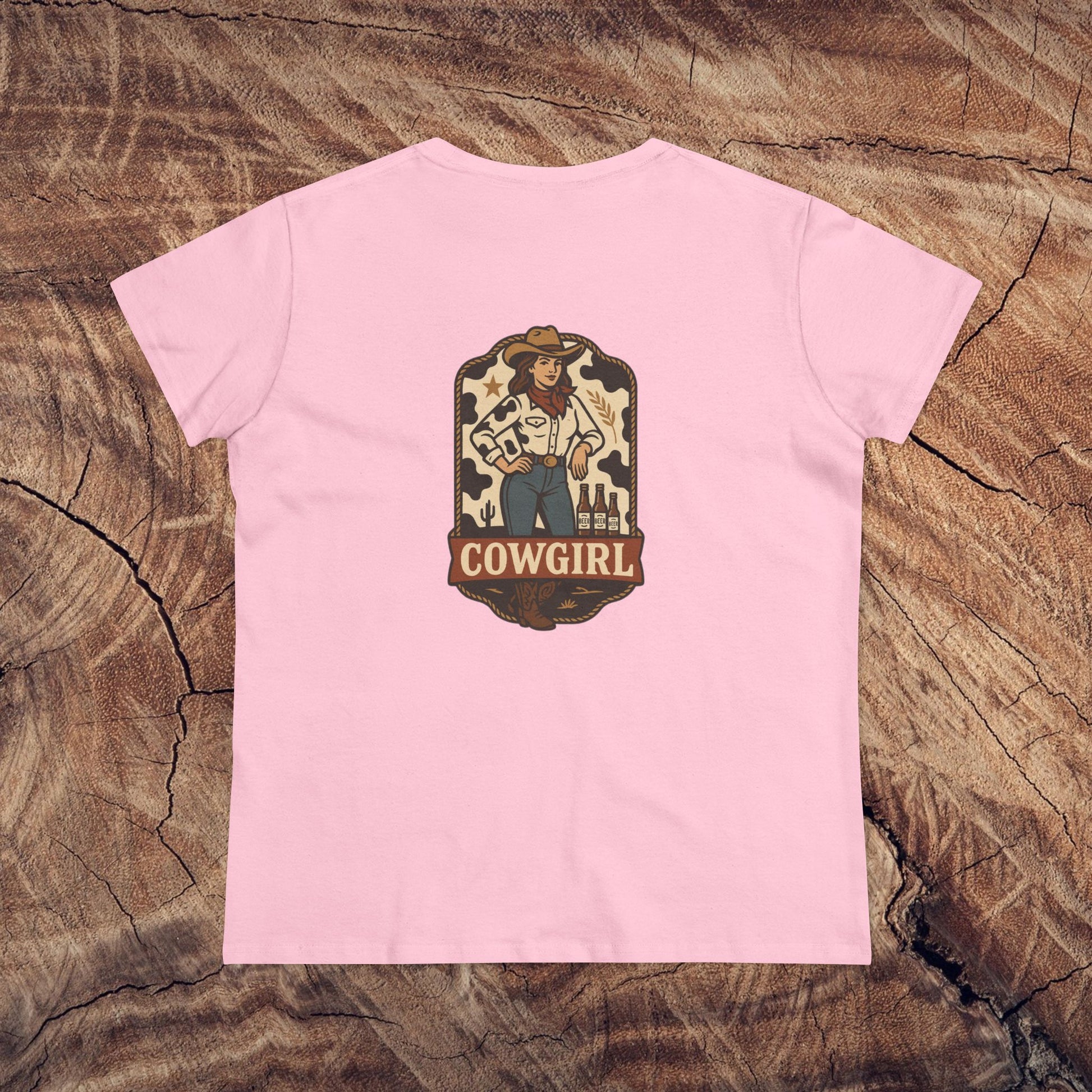 Pink Country Roots Cowgirl Tee featuring a cowgirl graphic on the back, perfect for those who love a Western flair.