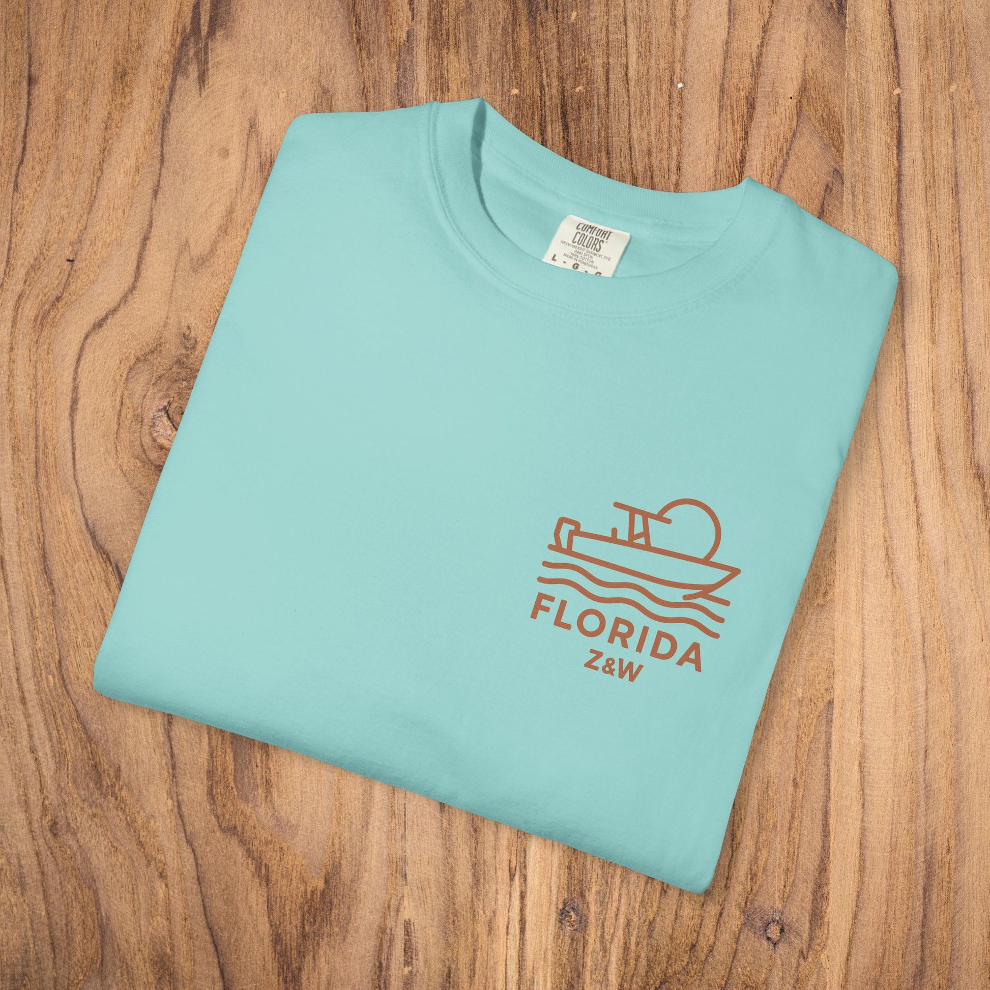 Unisex Florida Graphic Tee in turquoise, made from soft US cotton, perfect for casual wear and stylish layering.