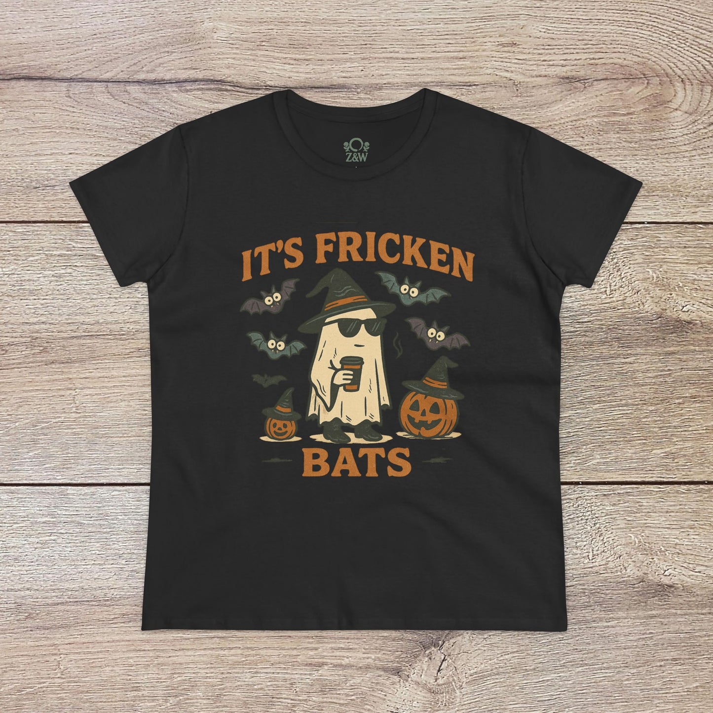 Halloween Unisex T-Shirt in black showcasing a graphic design of a cool ghost with a drink, bats, and pumpkins; crafted from 100% cotton, ideal for festive events.