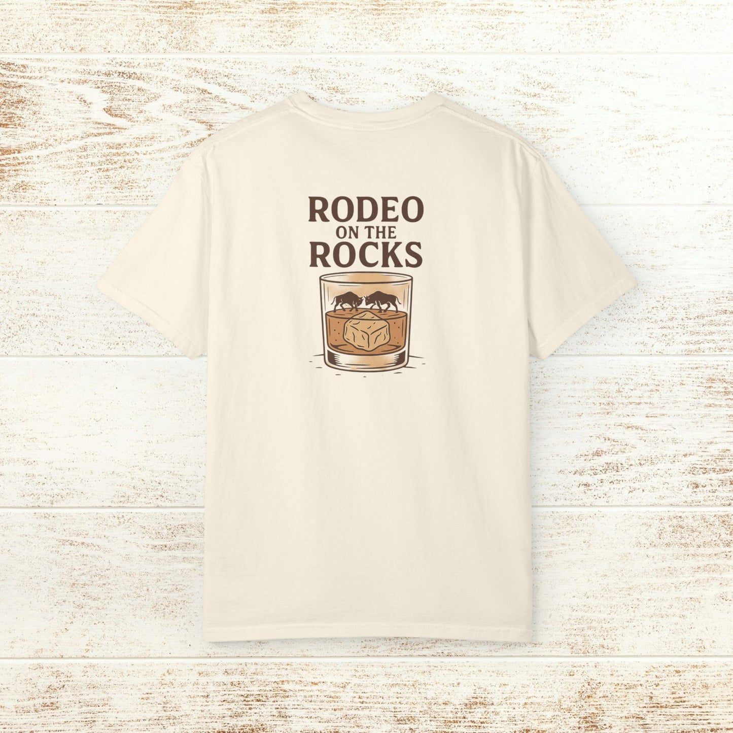 Rodeo On The Rocks Tee - Back view displaying a graphic of a drink in a glass with 'RODEO ON THE ROCKS' text, showcasing its stylish design.