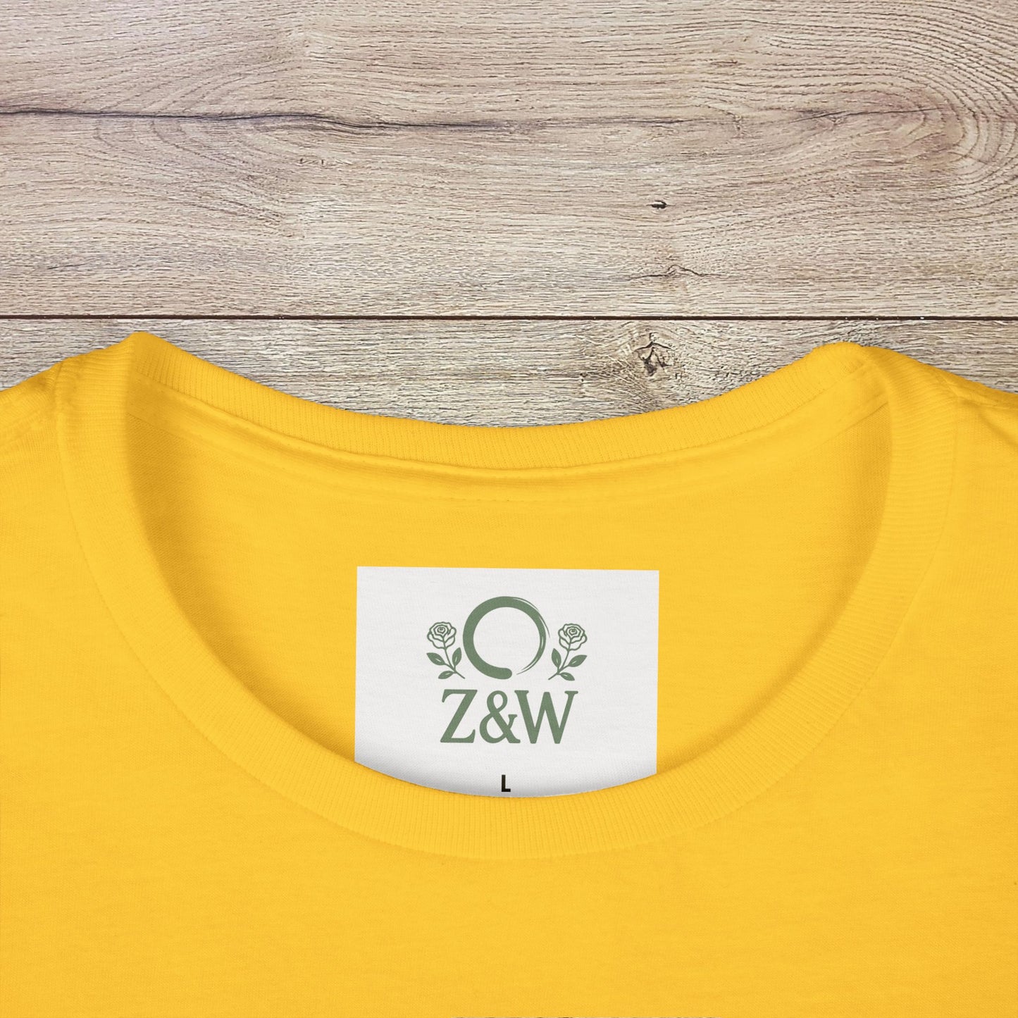 Close-up of the collar area of a yellow Sippin' Through The Seasons Slim Fit Tee, featuring the Z&W label, perfect for comfort and style.