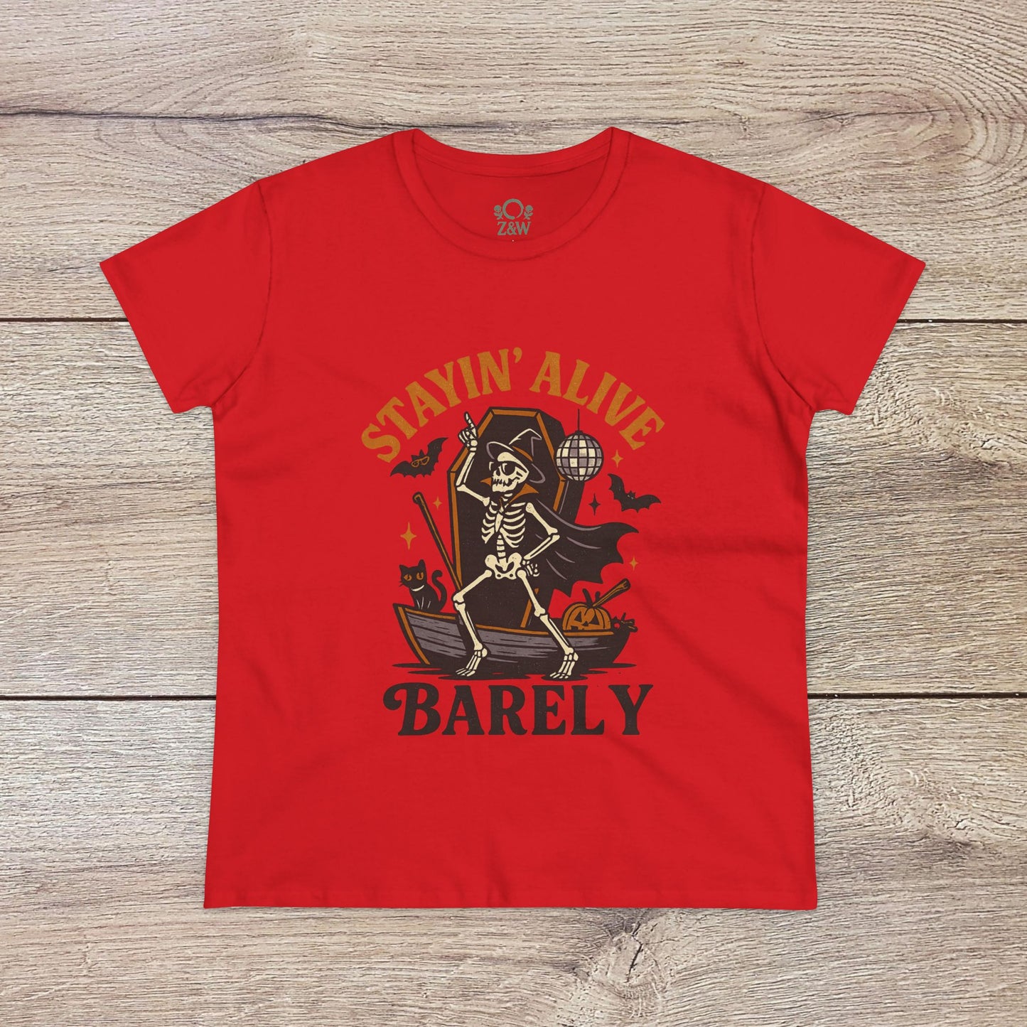 Stayin’ Alive T-Shirt in red with a skeleton design, perfect for Halloween, featuring the playful text 'BARELY'. Ideal for a fun and quirky costume.