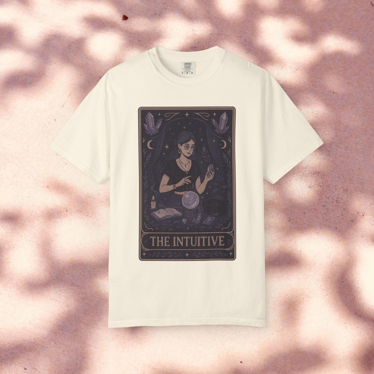 Intuitive Tarot Tee in classic white, showcasing a unique illustration of a fortune teller with tarot cards, crafted from high-quality 100% cotton.