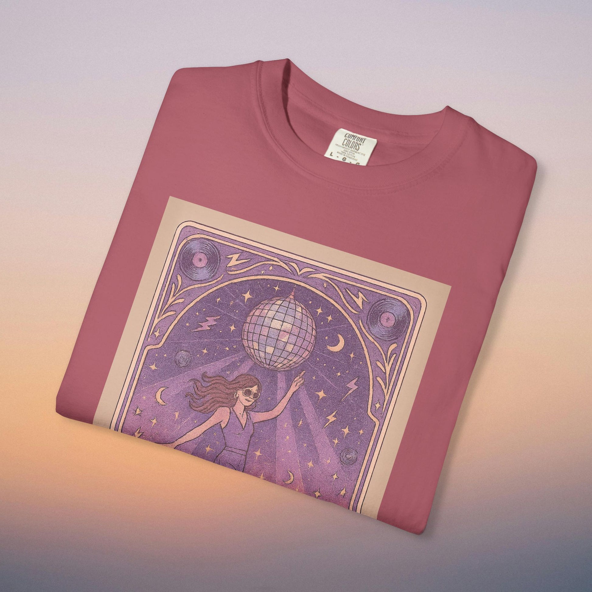 Groove Tarot Graphic Tee in deep rose, featuring a creative design of a figure holding a disco ball, a great addition to any casual wardrobe.