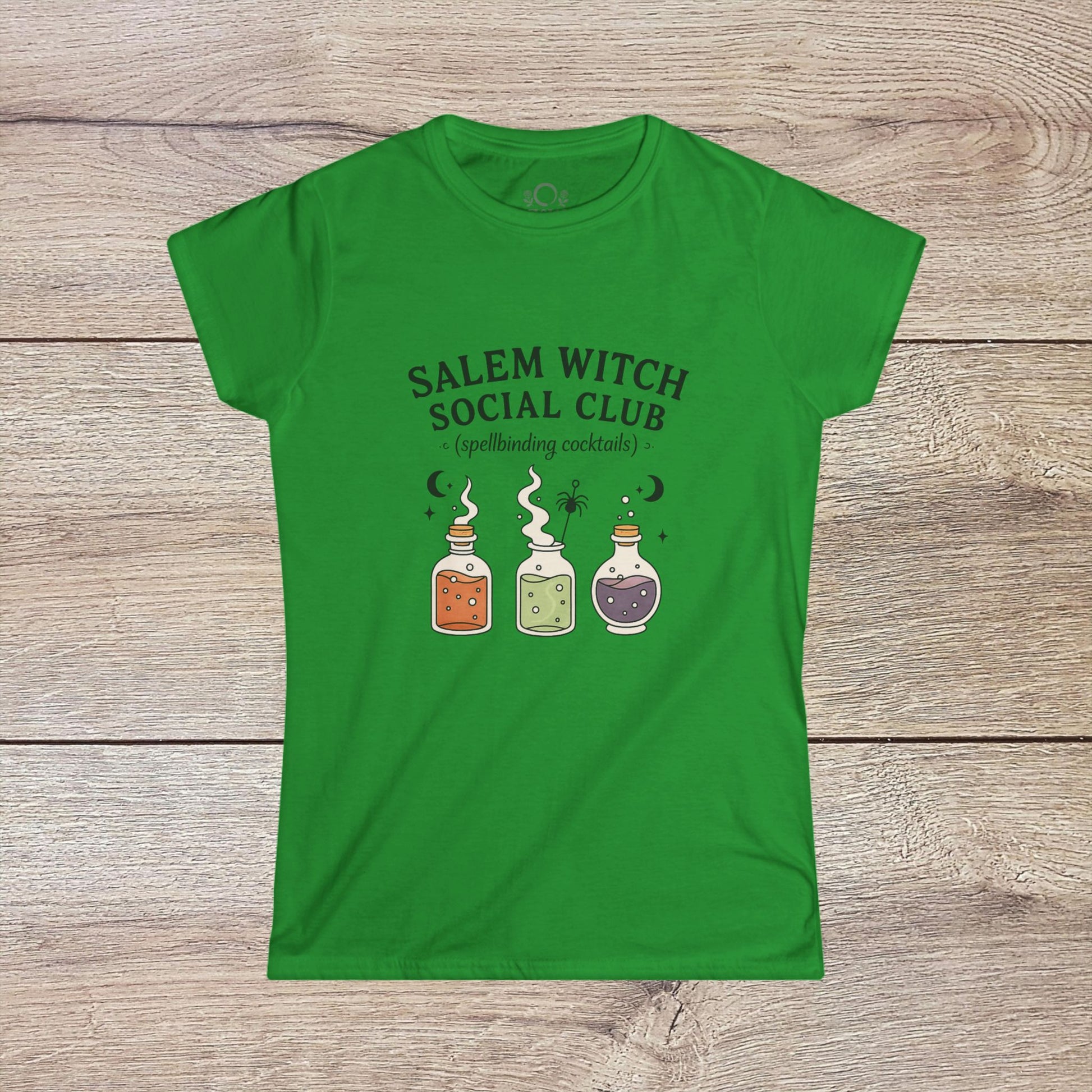 Salem Witch Social Club Graphic Tee featuring charming potion bottles and spellbinding cocktails design on a green background, crafted from 100% ring-spun cotton for a comfortable fit.