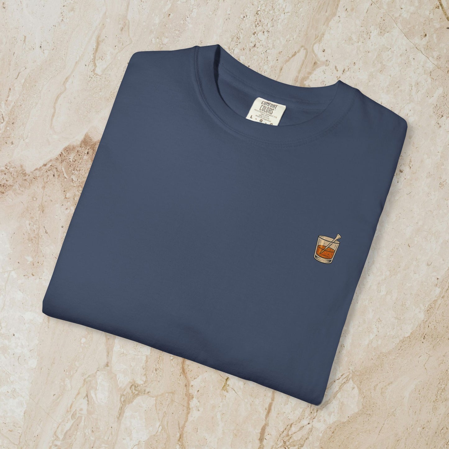 Golden Whiskey Dog Tee - Unique Vintage Style, with a whiskey glass pocket design on a navy colored 100% cotton tee, perfect for casual wear.