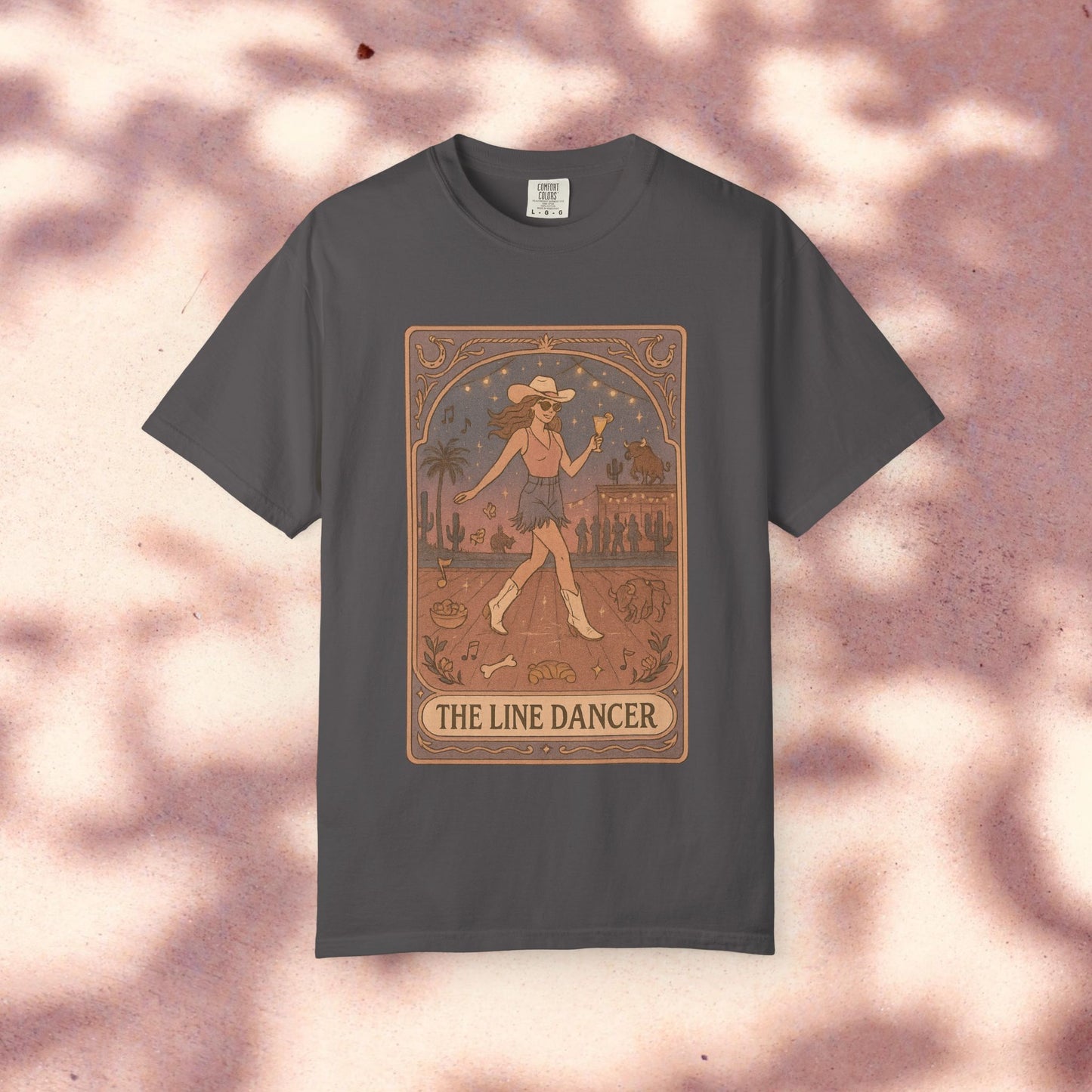 Line Dancer Tarot Tee displayed in a stylish grey shade, featuring a charming design of a dancing cowboy, designed for comfort and style in sizes S to 4XL.