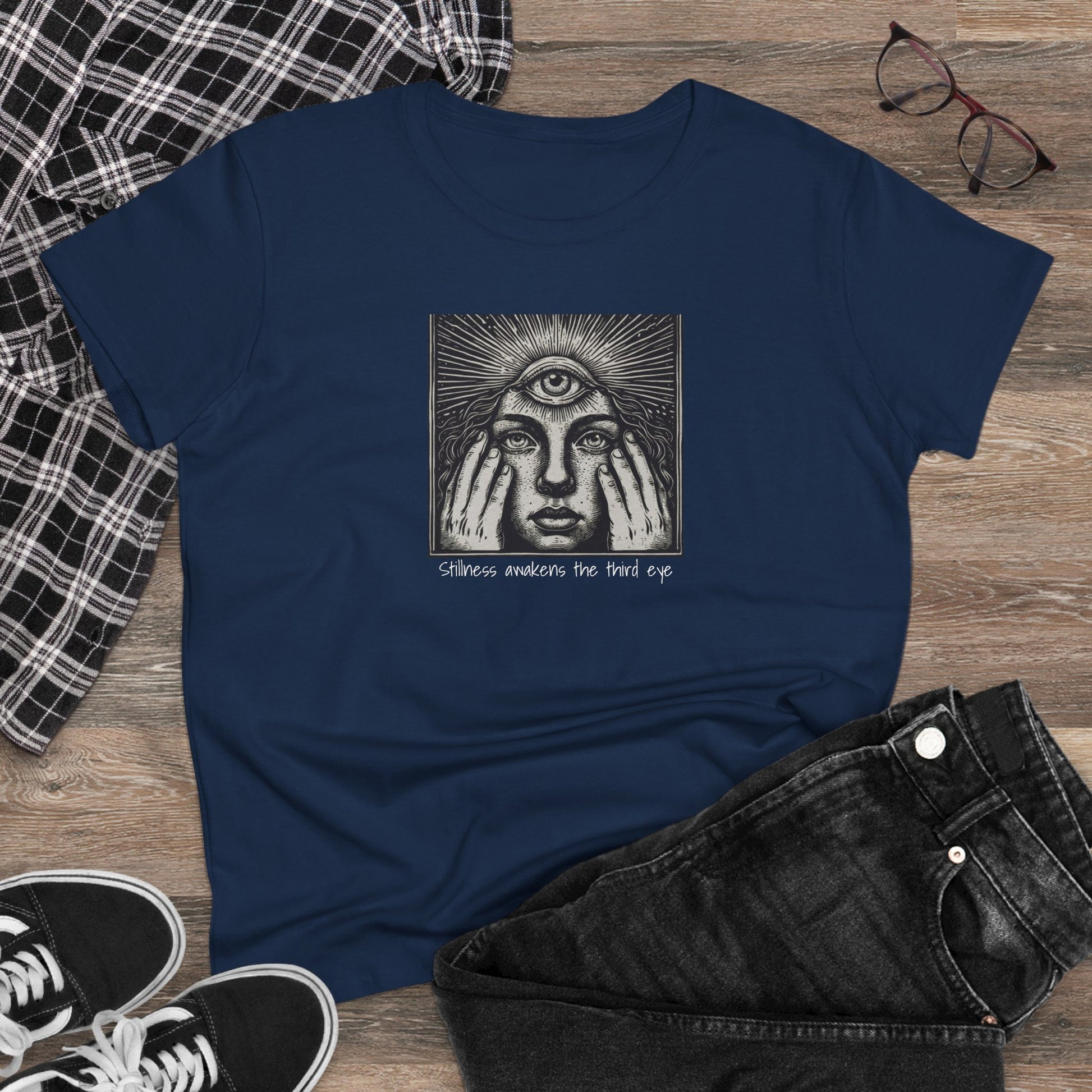 Casual styled image of the Stylish Third Eye Graphic Tee on a flat lay with jeans and sneakers, perfect for a trendy outfit.