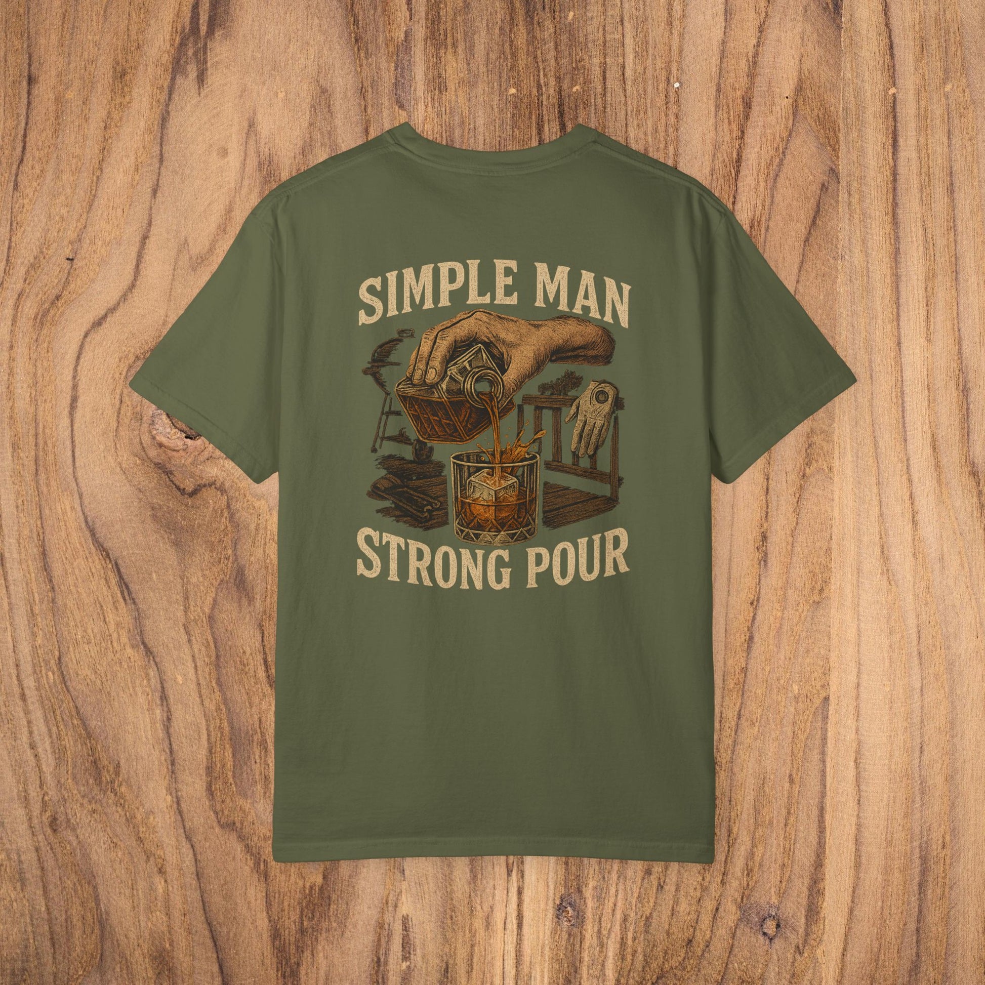 Simple Man Strong Pour T-Shirt in olive green showcasing a stylish graphic of a beverage pour, designed for casual elegance and made with ethically sourced 100% cotton for a comfortable wear.