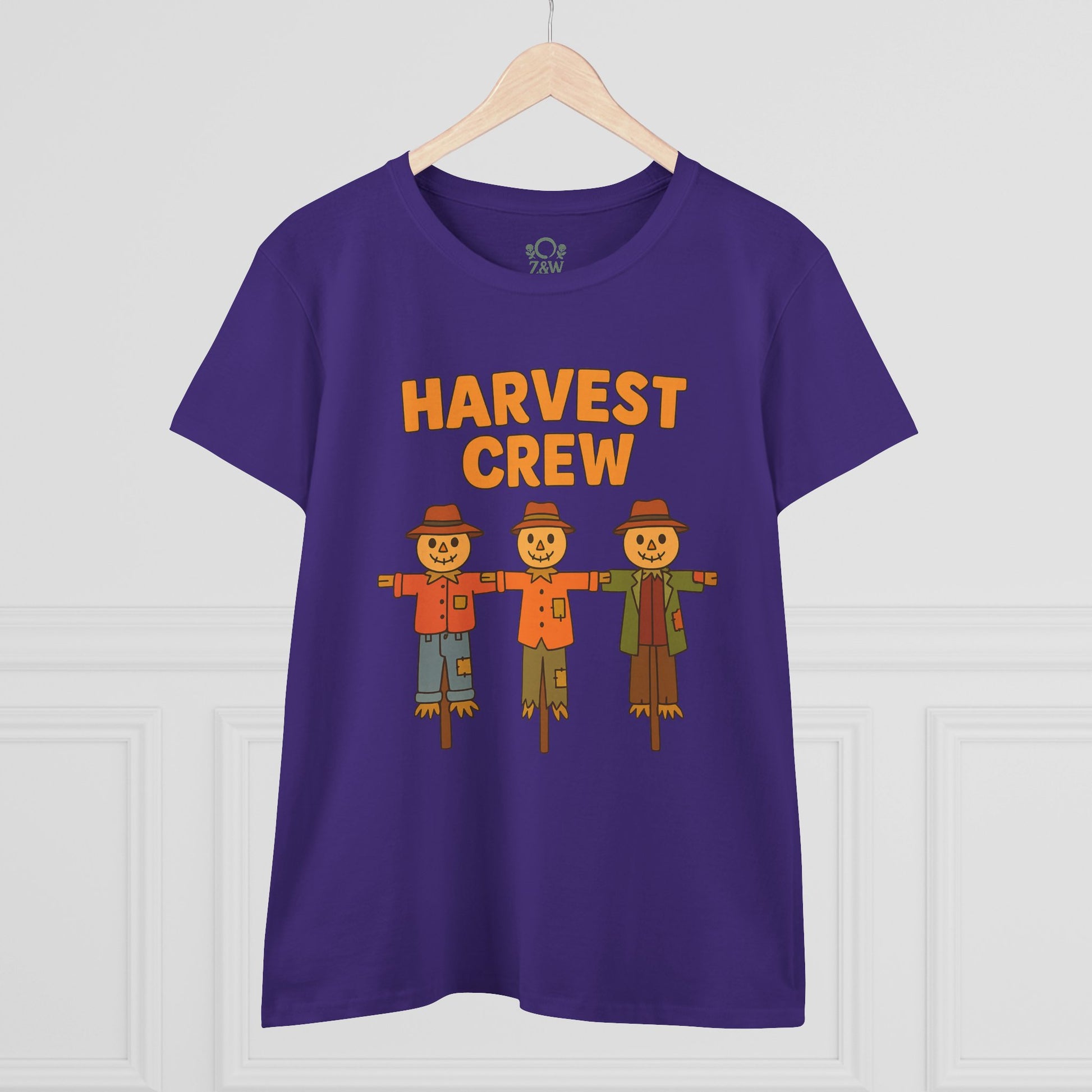 Front view of the Harvest Crew Halloween T-Shirt - Soft 100% Ring-Spun Cotton in purple, showcasing three cheerful scarecrow characters with the text 'HARVEST CREW'.