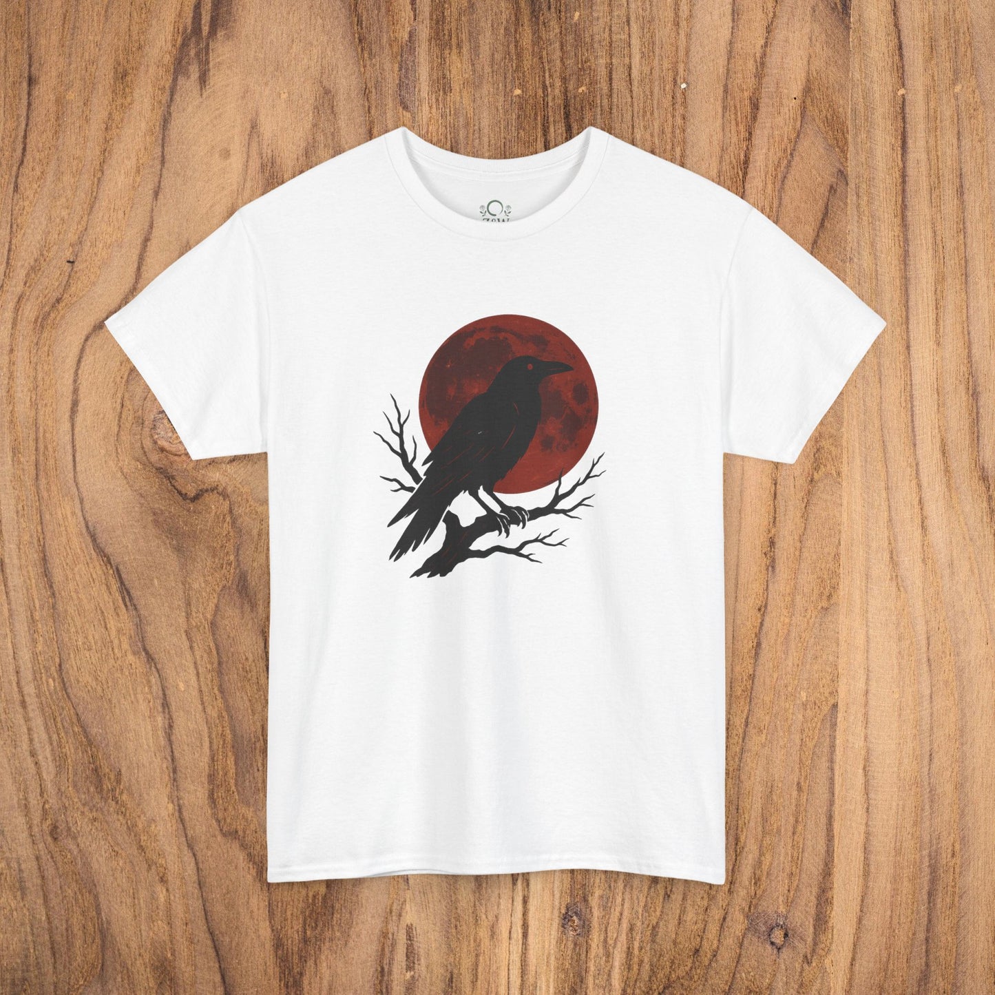 Gothic Raven T-Shirt in classic white, displaying a bold raven silhouette against a red moon, a stylish choice for Halloween and casual wear.