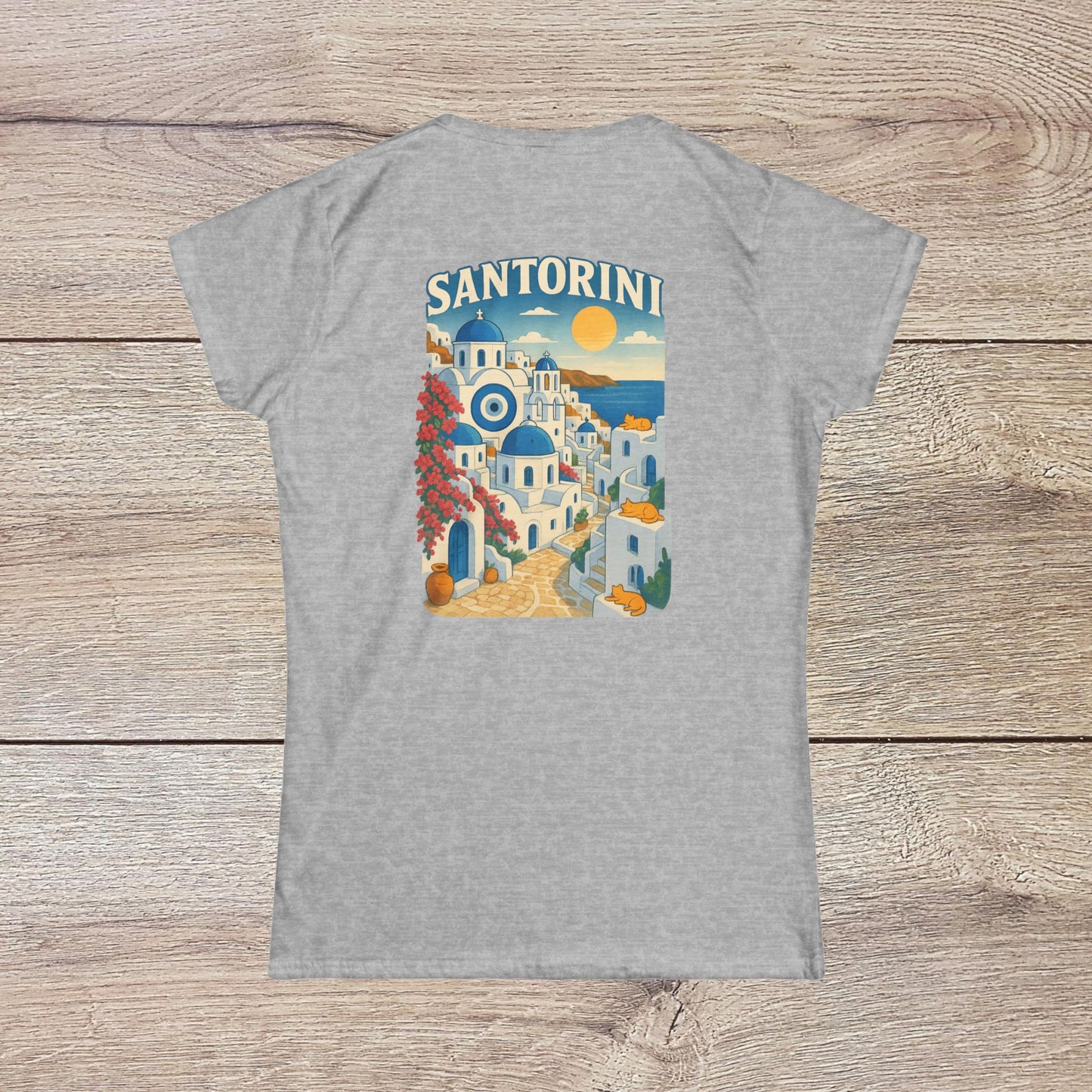 Back view of the Santorini Tee in grey, showcasing an artistic depiction of Santorini's iconic buildings and sunset, crafted from eco-friendly materials.