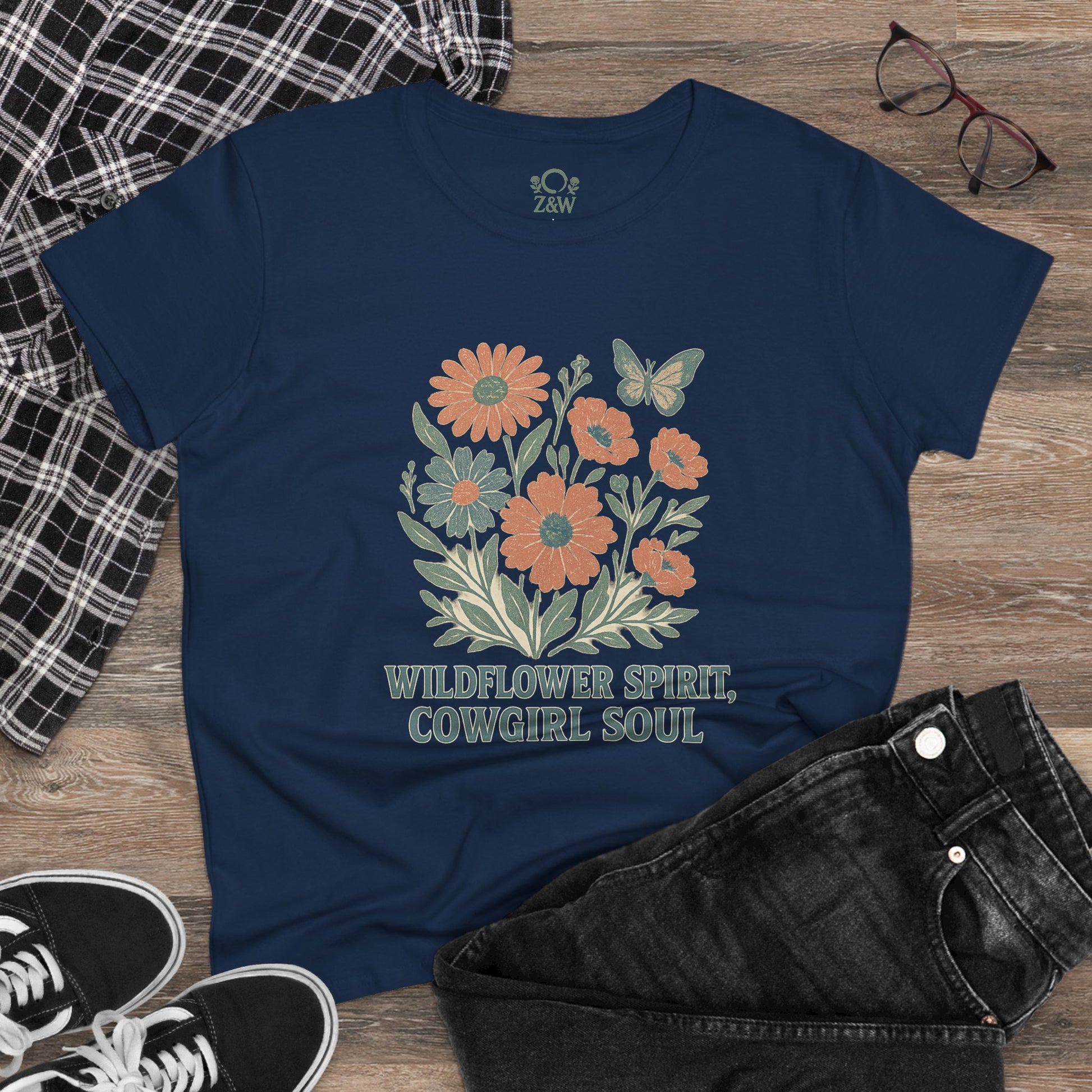Wildflower Spirit Cotton Tee in navy blue, highlighting a beautiful floral and butterfly illustration, made for lasting comfort and style.