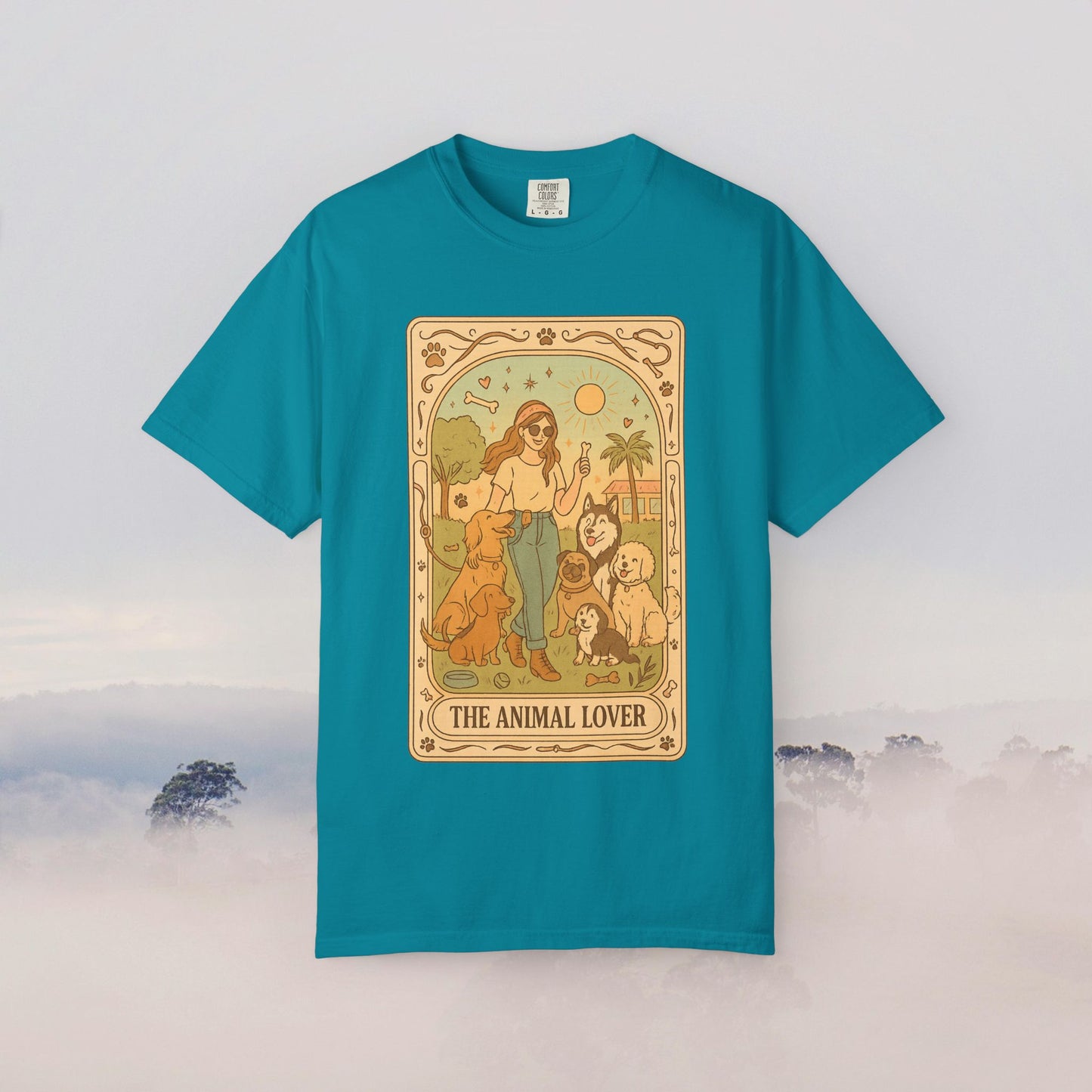 Animal Lover Tarot Tee in teal, highlighting a beautiful design of a woman alongside pets, made from soft 100% cotton, offered in sizes S to 4XL, eco-friendly and durable.