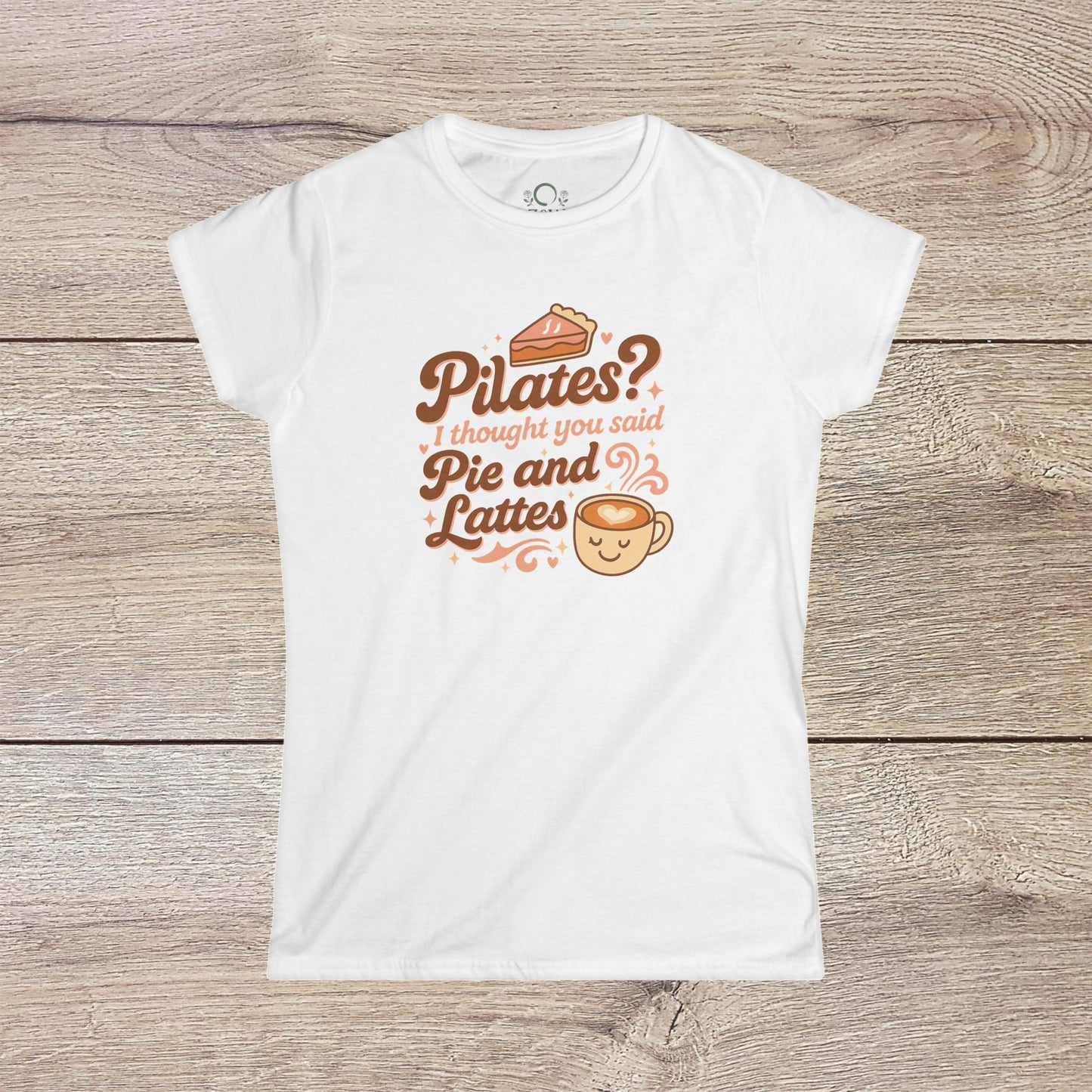 Funny Pilates T-Shirt with Durable Shoulder Tape showcasing playful design 'Pilates? I thought you said Pie and Lattes' on a white fabric. Ideal for casual occasions.