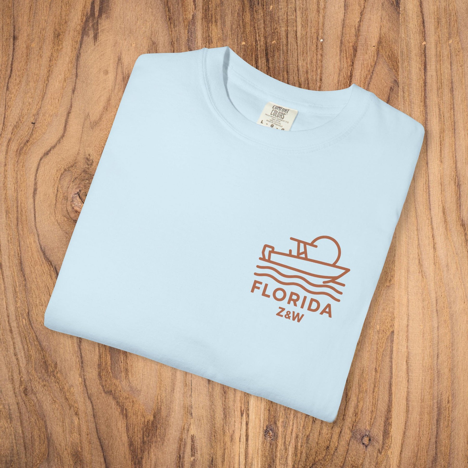 Unisex Florida Graphic Tee in light blue, garment-dyed with a soft texture, perfect casual wear for any occasion.