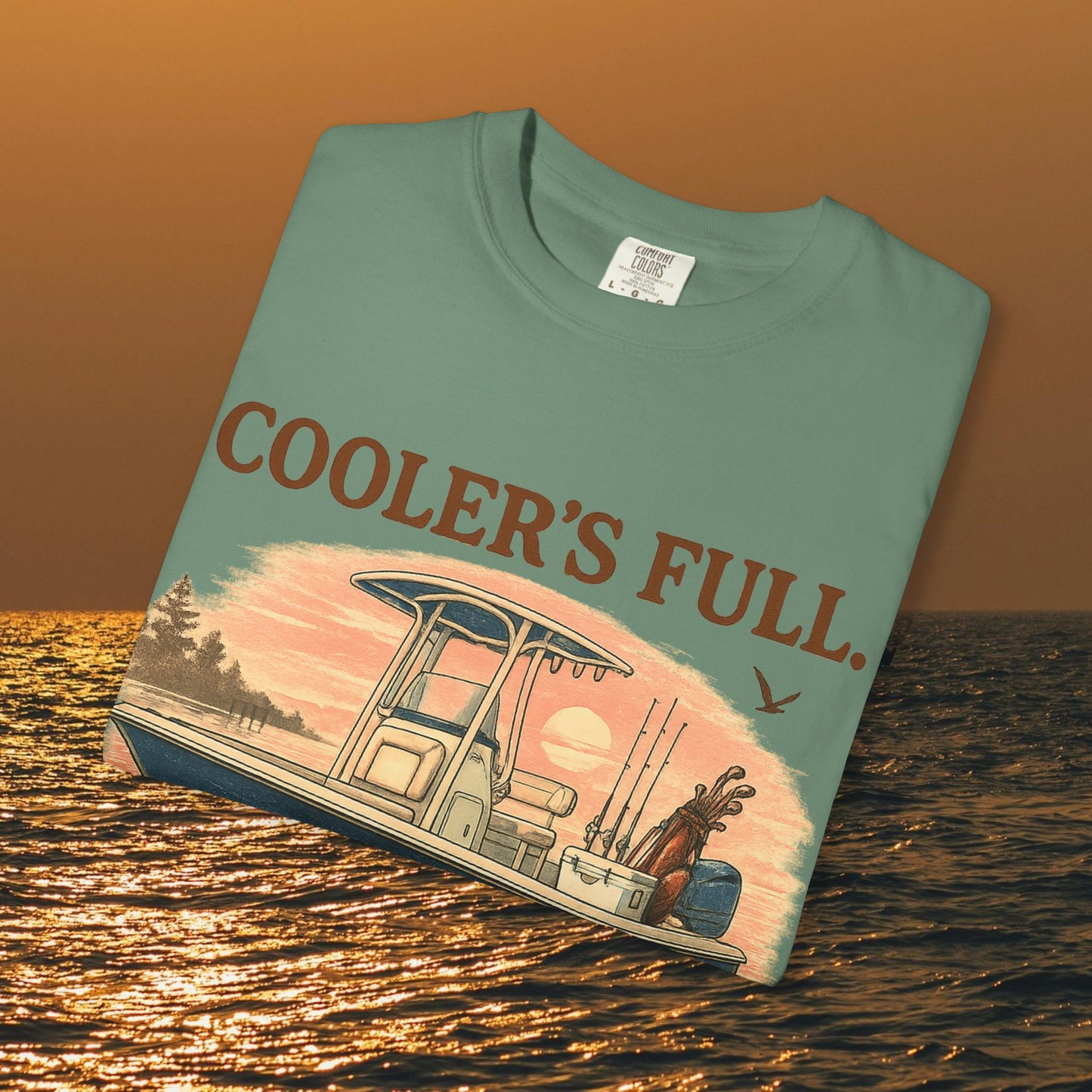 Close-up of the Men's & Women's Durable Cotton Full Tee in teal, highlighting the artistic print with 'Cooler's Full.' text and a boat illustration.