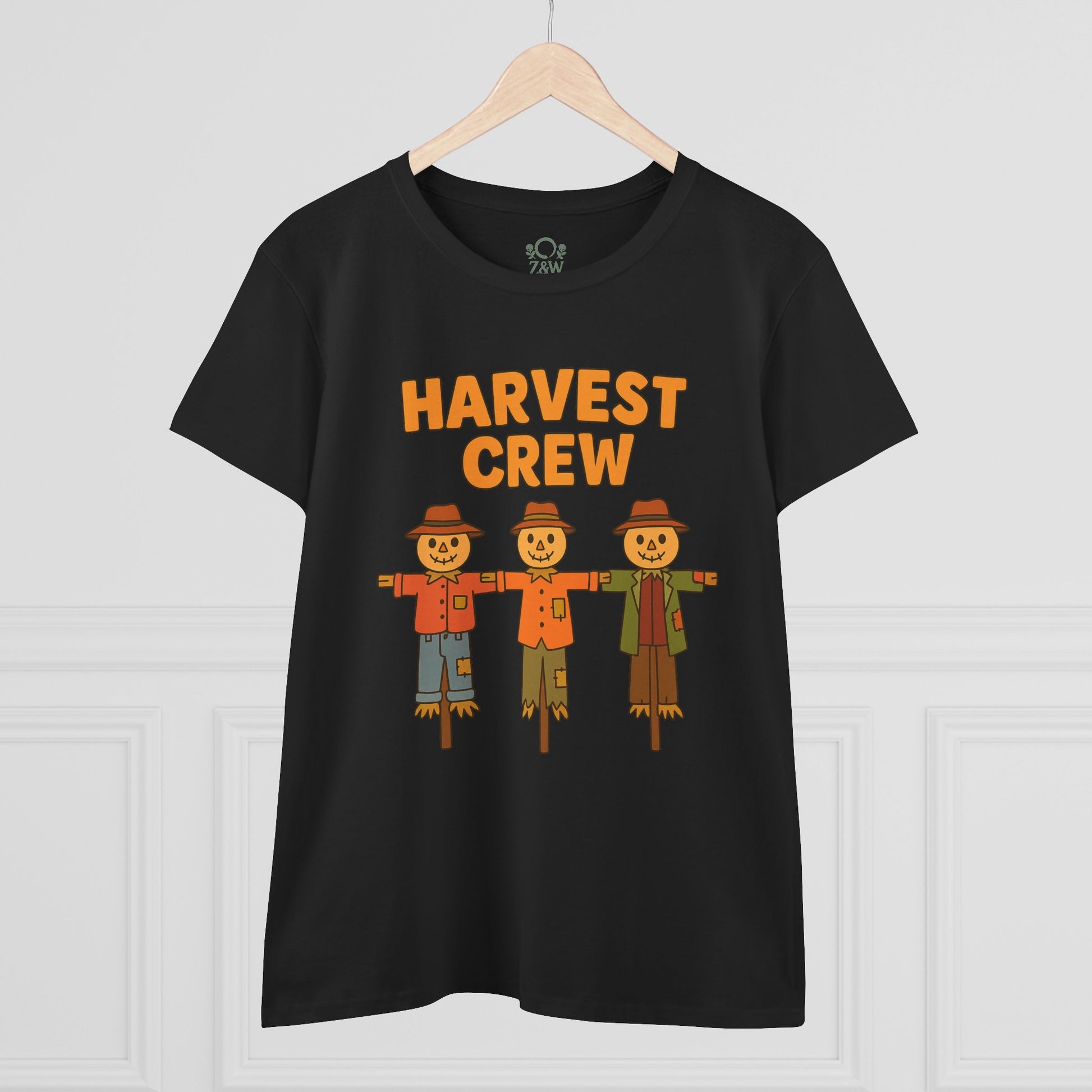 Front view of the black Harvest Crew Halloween T-Shirt with vibrant scarecrow design, crafted from soft and eco-friendly 100% ring-spun cotton.