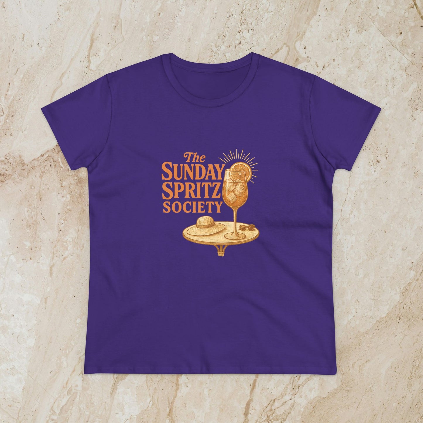 Vibrant purple Women's Midweight Cotton Tee featuring 'The Sunday Spritz Society' design, perfect for casual wear and summer outings.