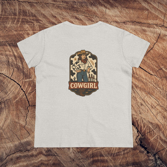 Country Roots Cowgirl Tee in soft gray, showcasing a bold cowgirl illustration on the back, designed for comfort and style for cowgirl enthusiasts.