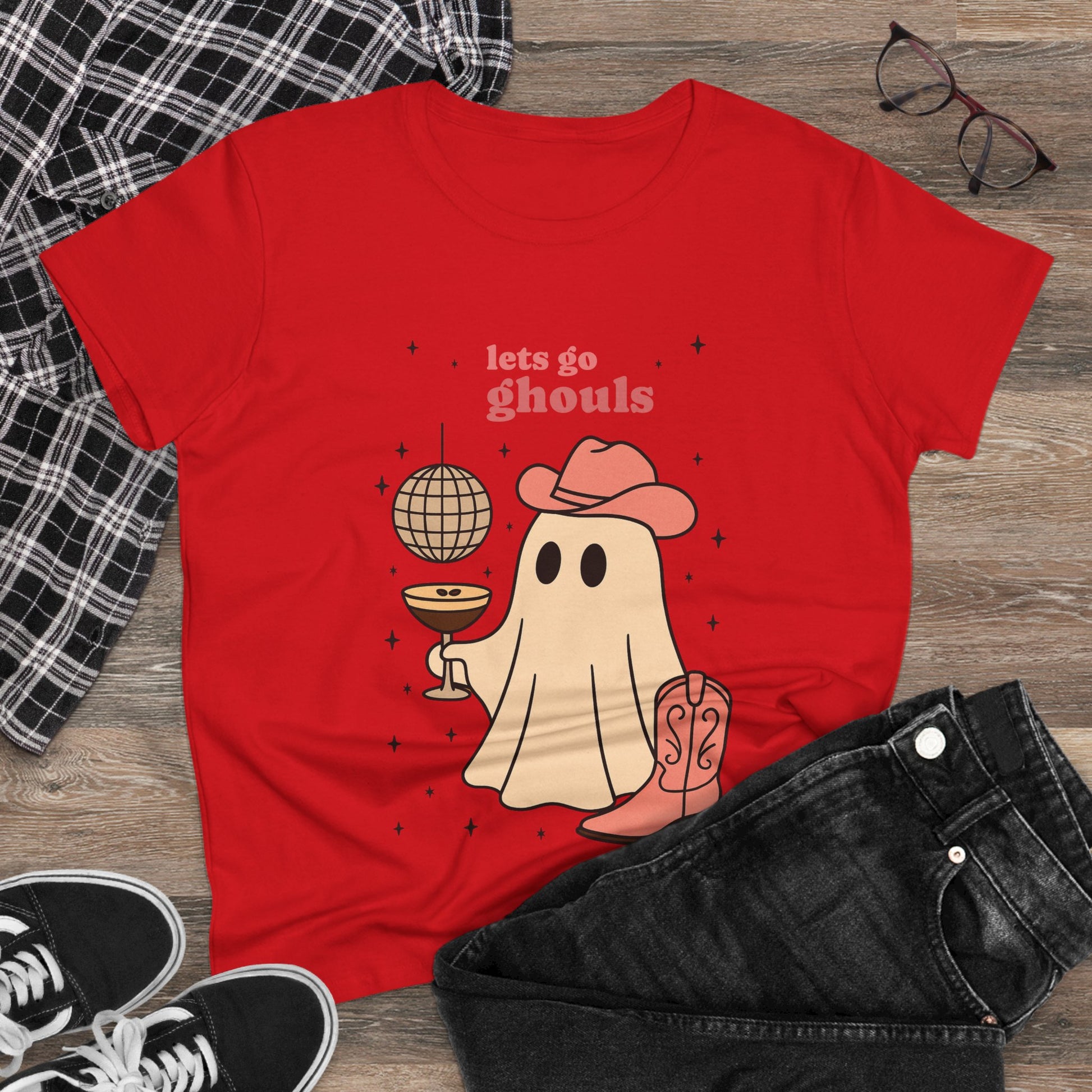 Let's Go Ghouls Tee in red showcasing a cute ghost character with a drink and a cowboy hat, ideal for Halloween festivities.