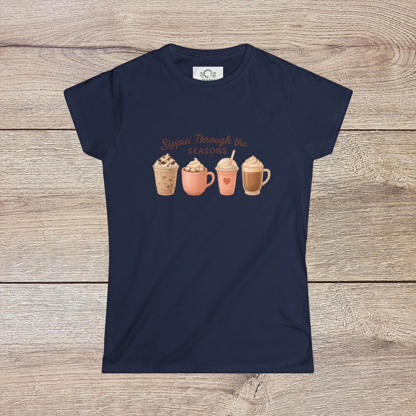 Sippin' Through The Seasons Slim Fit Tee in deep navy, displaying an artistic print of seasonal beverages, crafted from 100% combed cotton for a cozy wear.
